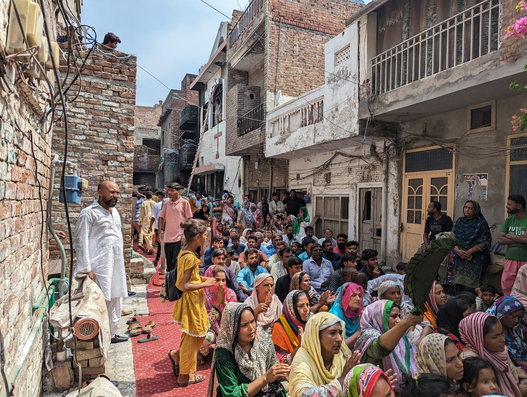 Sunday mass taking place in Christian Colony