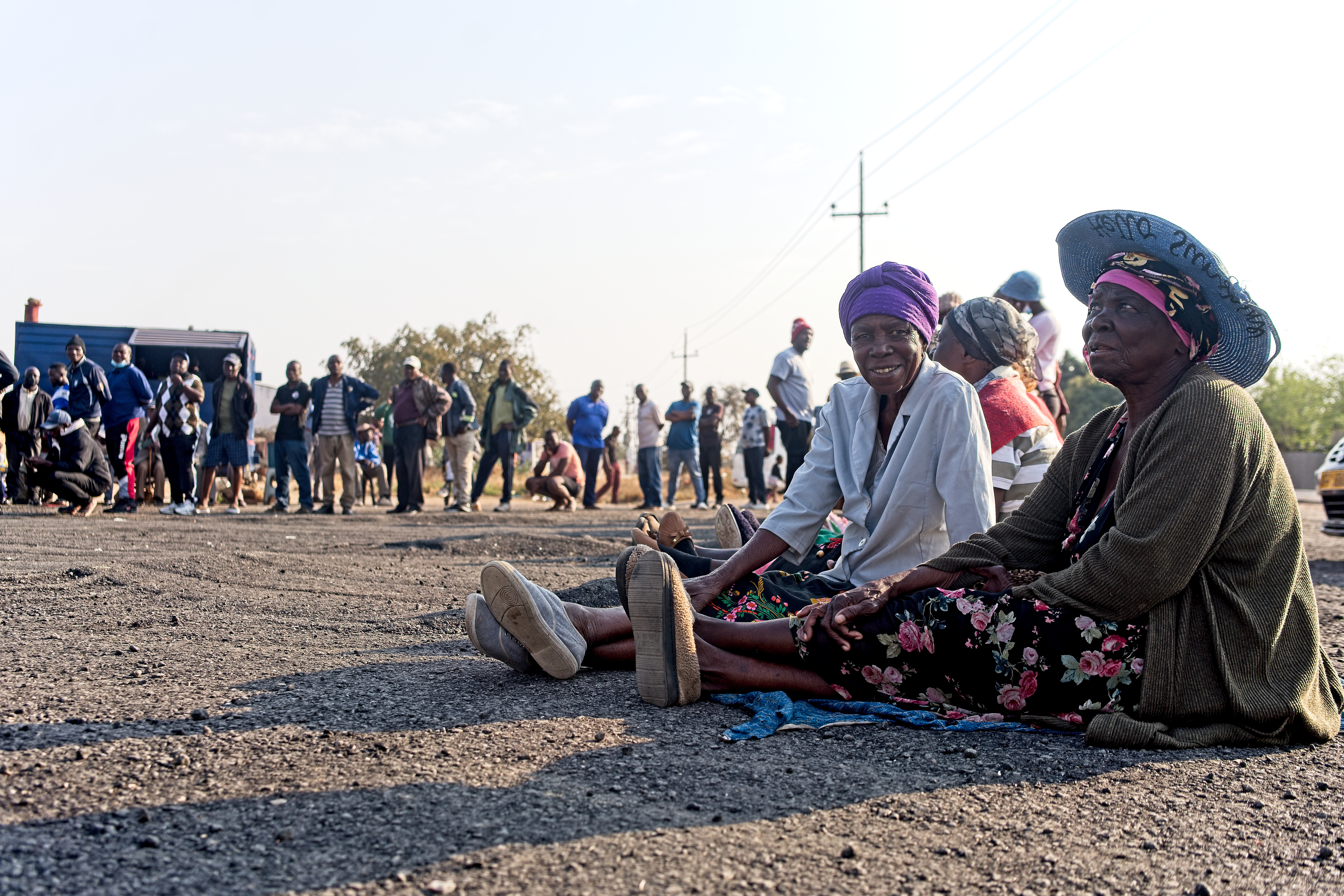Evelyn Dube, 76, a pensioner waits at the front of a long line of voters waiting to cast their votes in Emakhandeni suburb in Bulawayo, Zimabwe