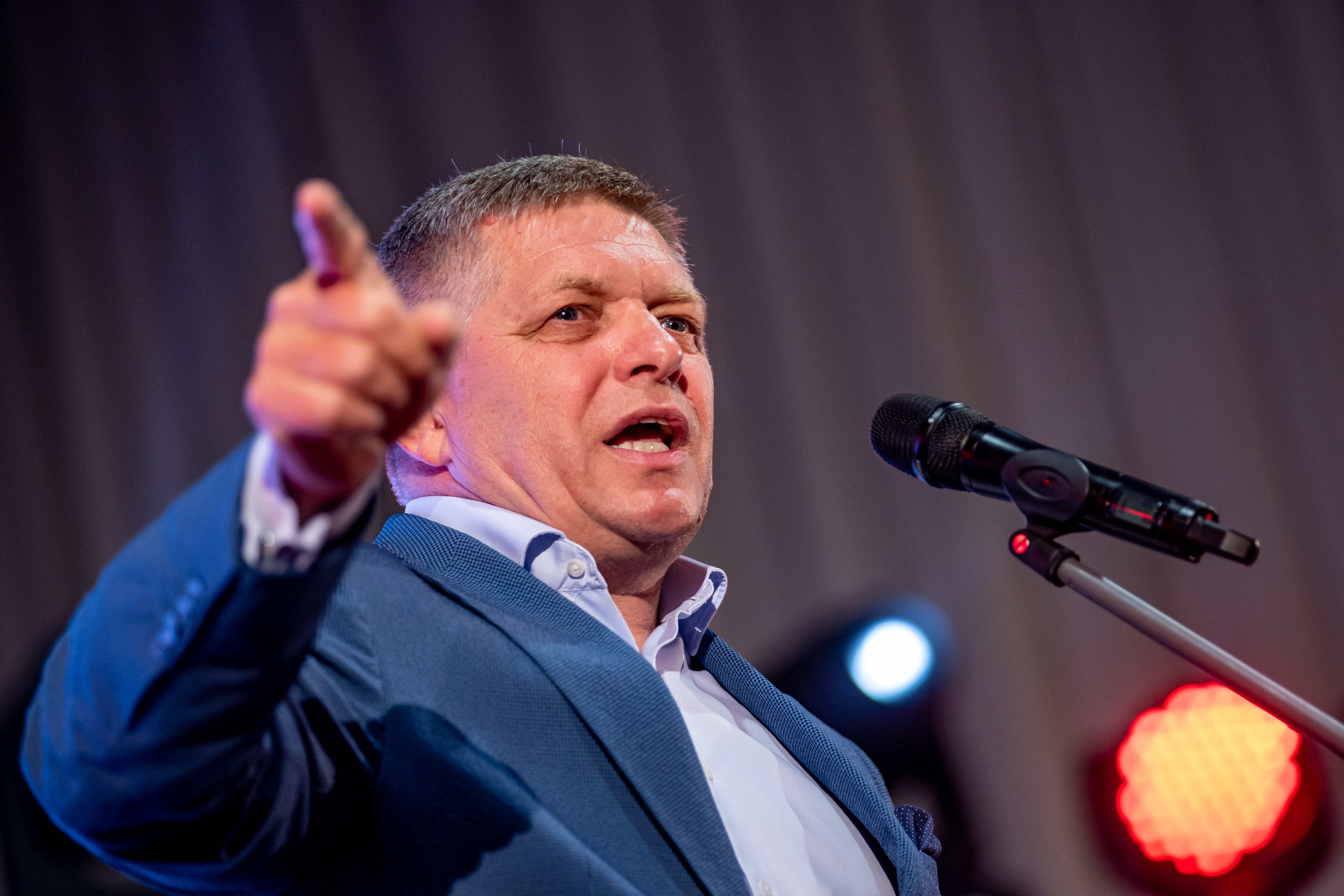 epa10856676 Slovak former Prime Minister and chairman of the Smer-SD party Robert Fico speaks at the party's election campaign rally in Nitra, Slovakia, 12 September 2023. Robert Fico, a socially conservative left-wing populist and two-time former prime minister, takes poll lead ahead of elections and his party has called for stop military aid to neighbouring Ukraine. Parliamentary elections in Slovakia will be held on 30 September 2023. EPA-EFE/MARTIN DIVISEK