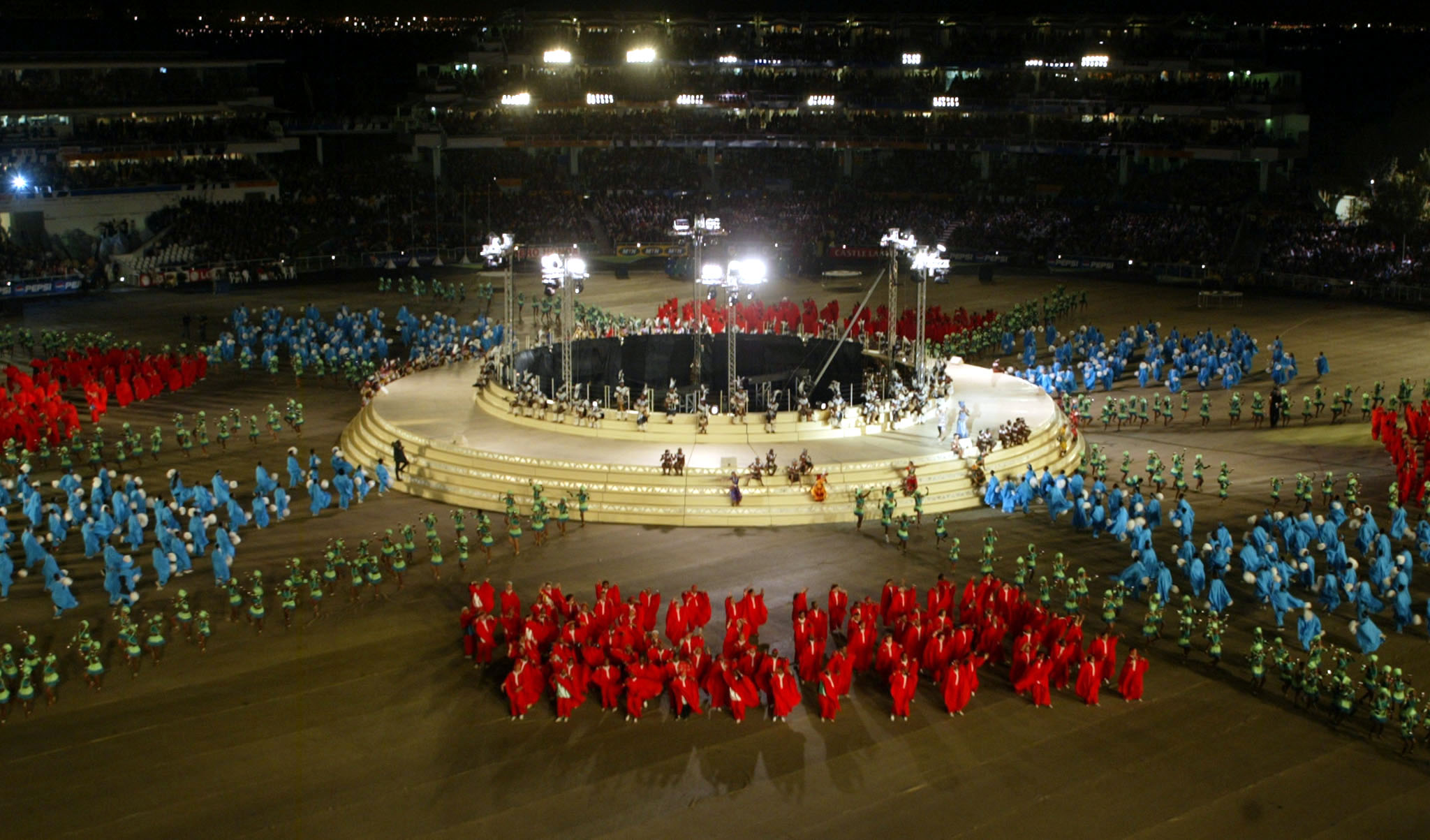 Performers parade during the opening ceremony.
