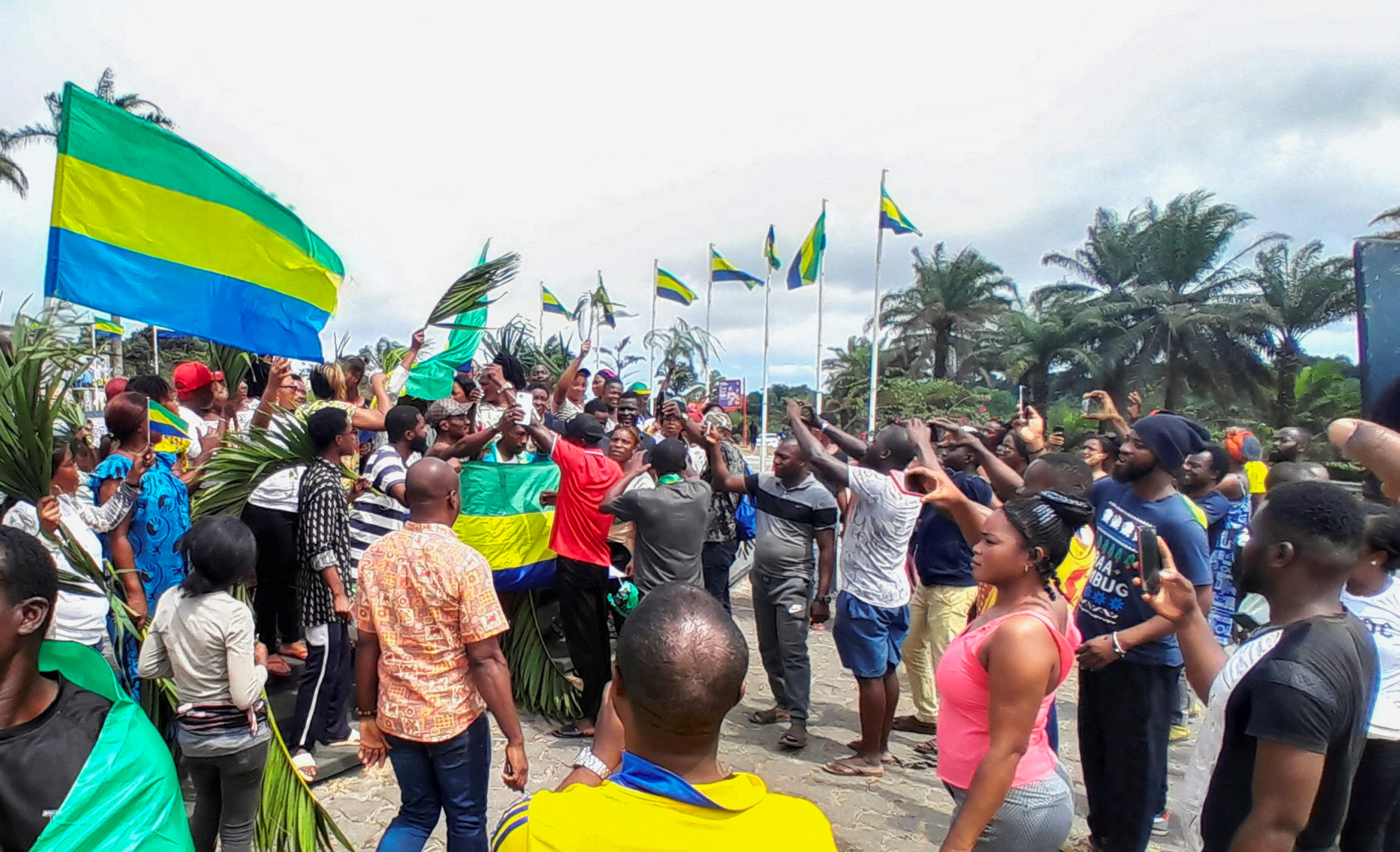 People celebrate in support of the putschists in the street of Libreville, Gabon August 30, 2023