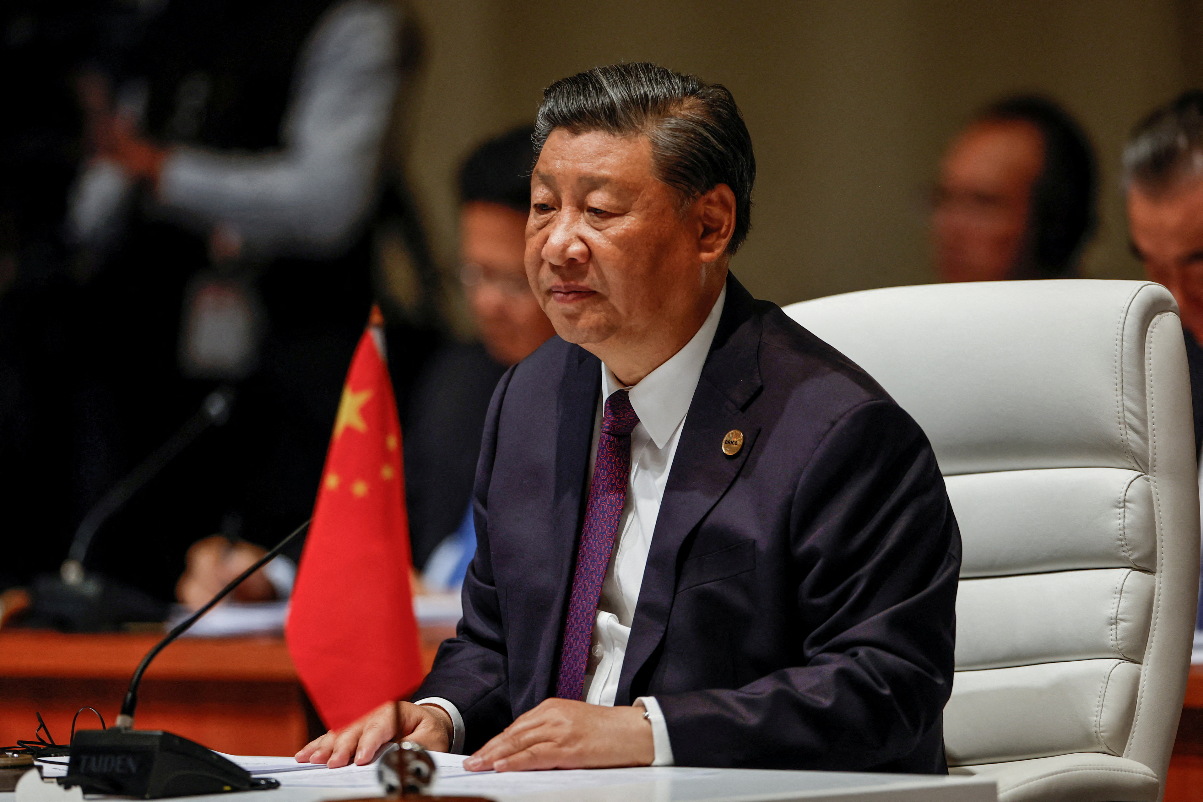xi