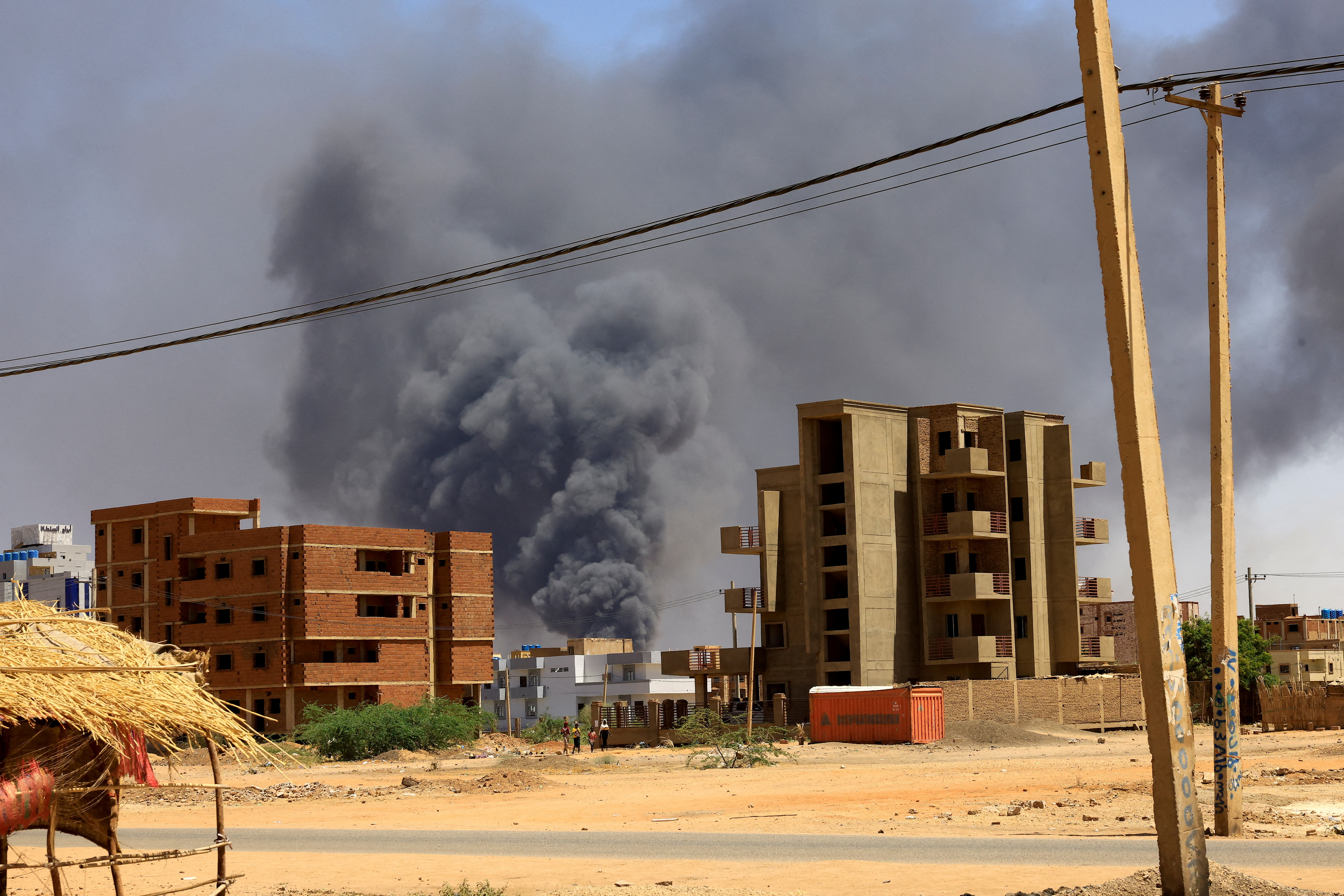 Smoke rises above buildings after an aerial bombardment during clashes between the paramilitary Rapid Support Forces and the army, in Khartoum North, Sudan, May 1, 2023. [File: Mohamed Nureldin Abdallah/Reuters]