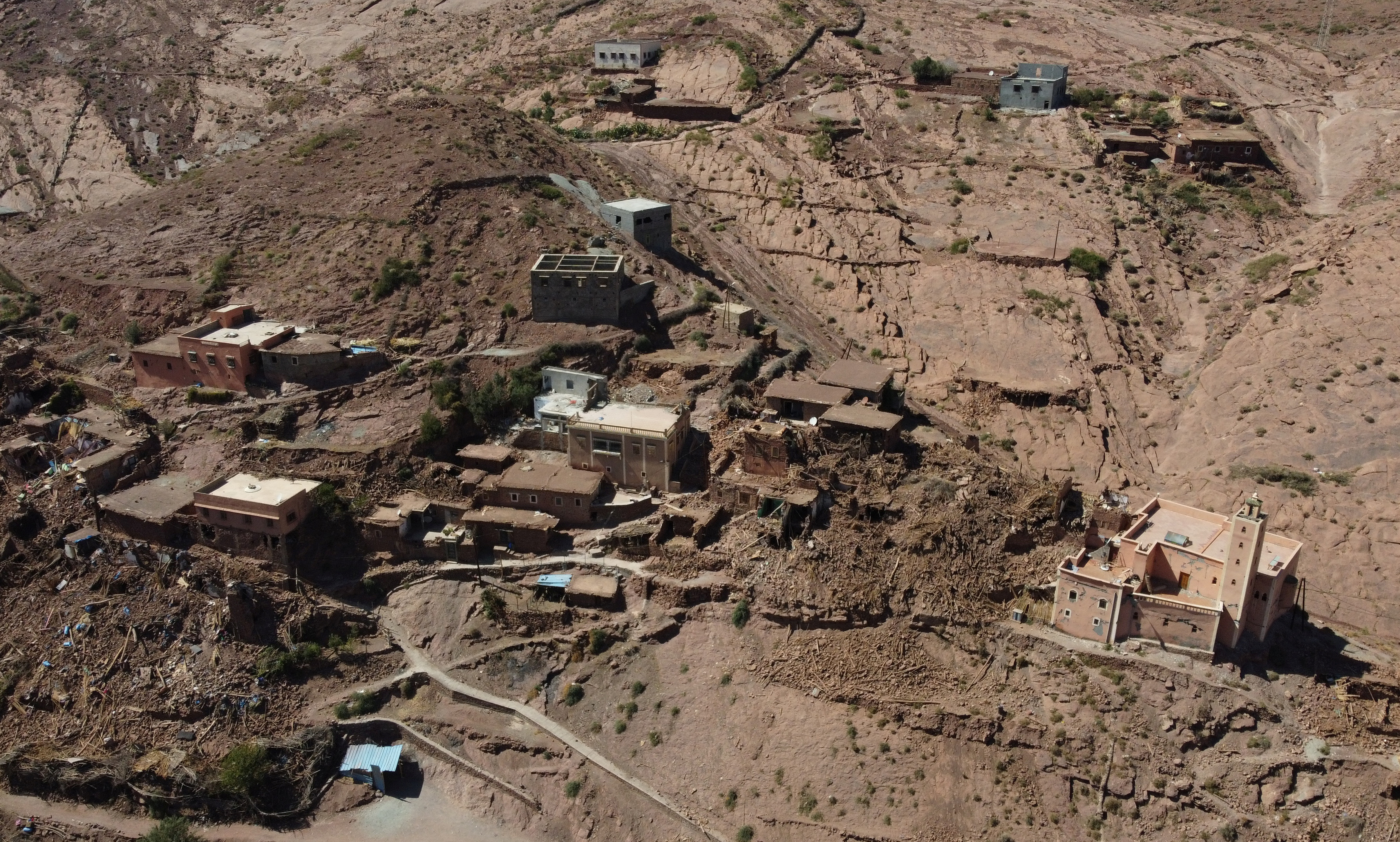 A view shows destroyed houses in the aftermath of a deadly earthquake in the village of Arghen Valley, Morocco, September 12, 2023. REUTERS/Nacho Doce
