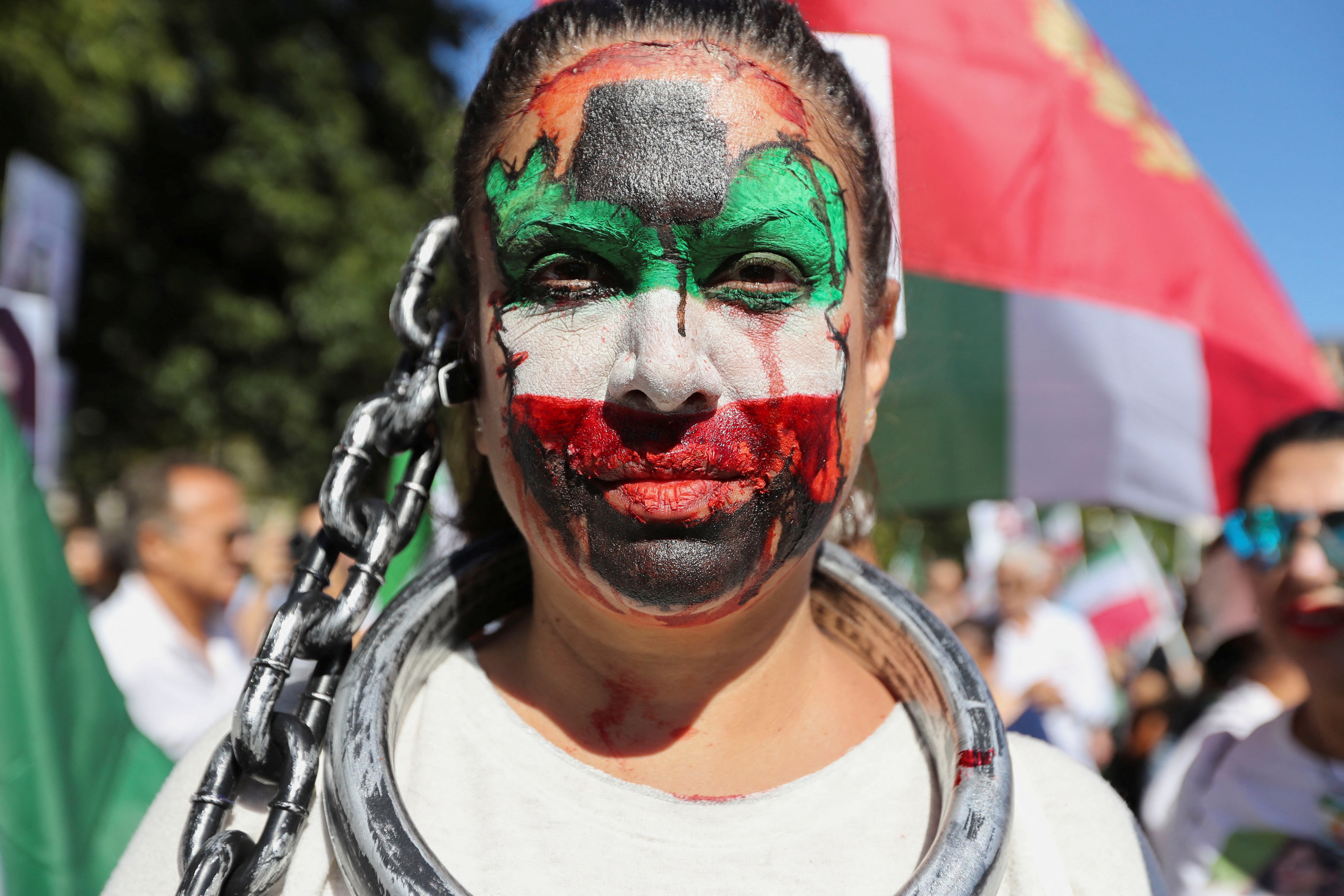 Khatareh Plesnick, from Baltimore, poses during a march in support of women's rights in Iran on the anniversary of the death of Mahsa Amini, outside the White House in Washington, US.