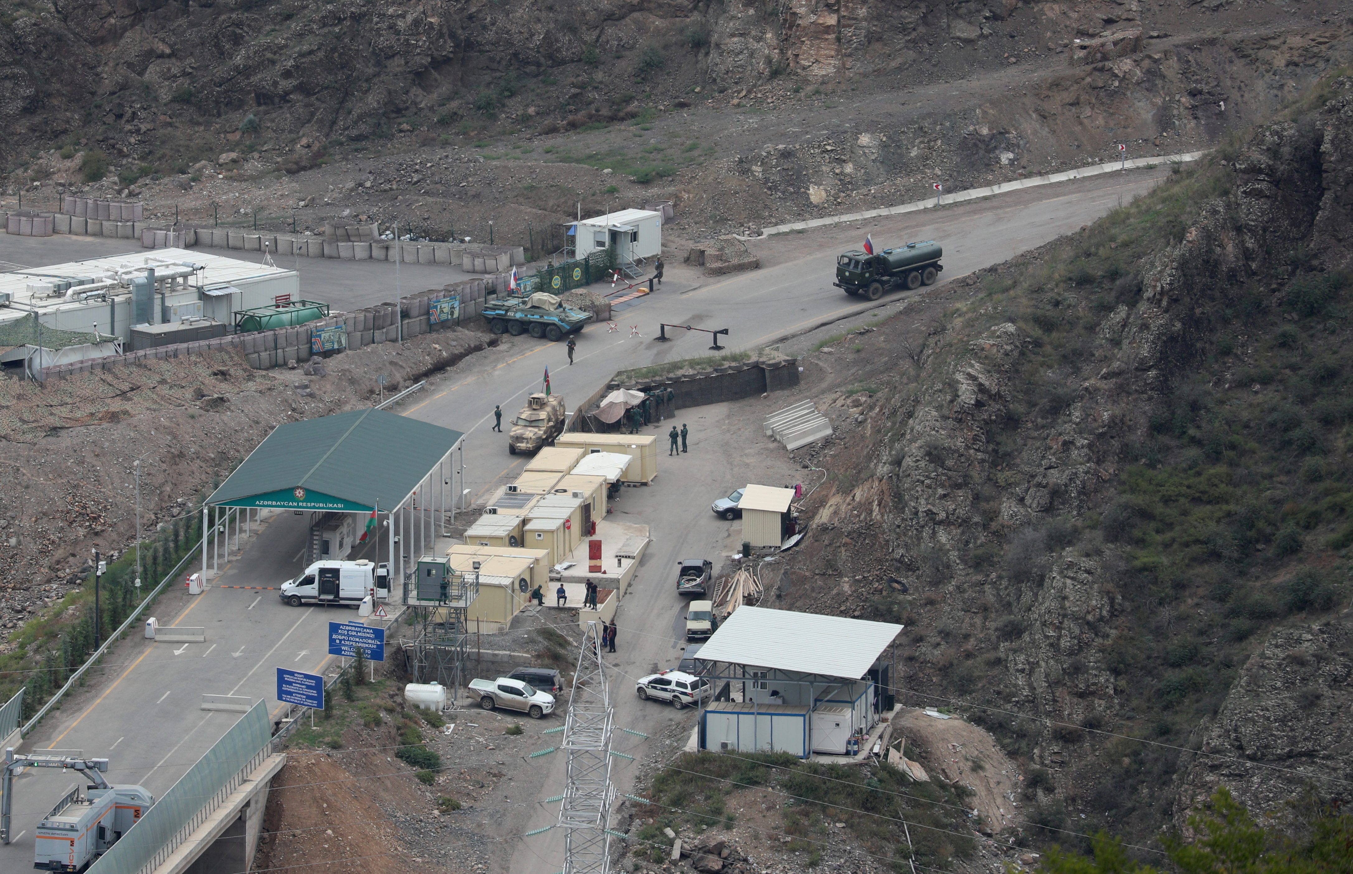 A view shows a border-crossing point on the frontier between Armenia and Azerbaijan and a base of Russian peacekeepers deployed in Nagorno-Karabakh