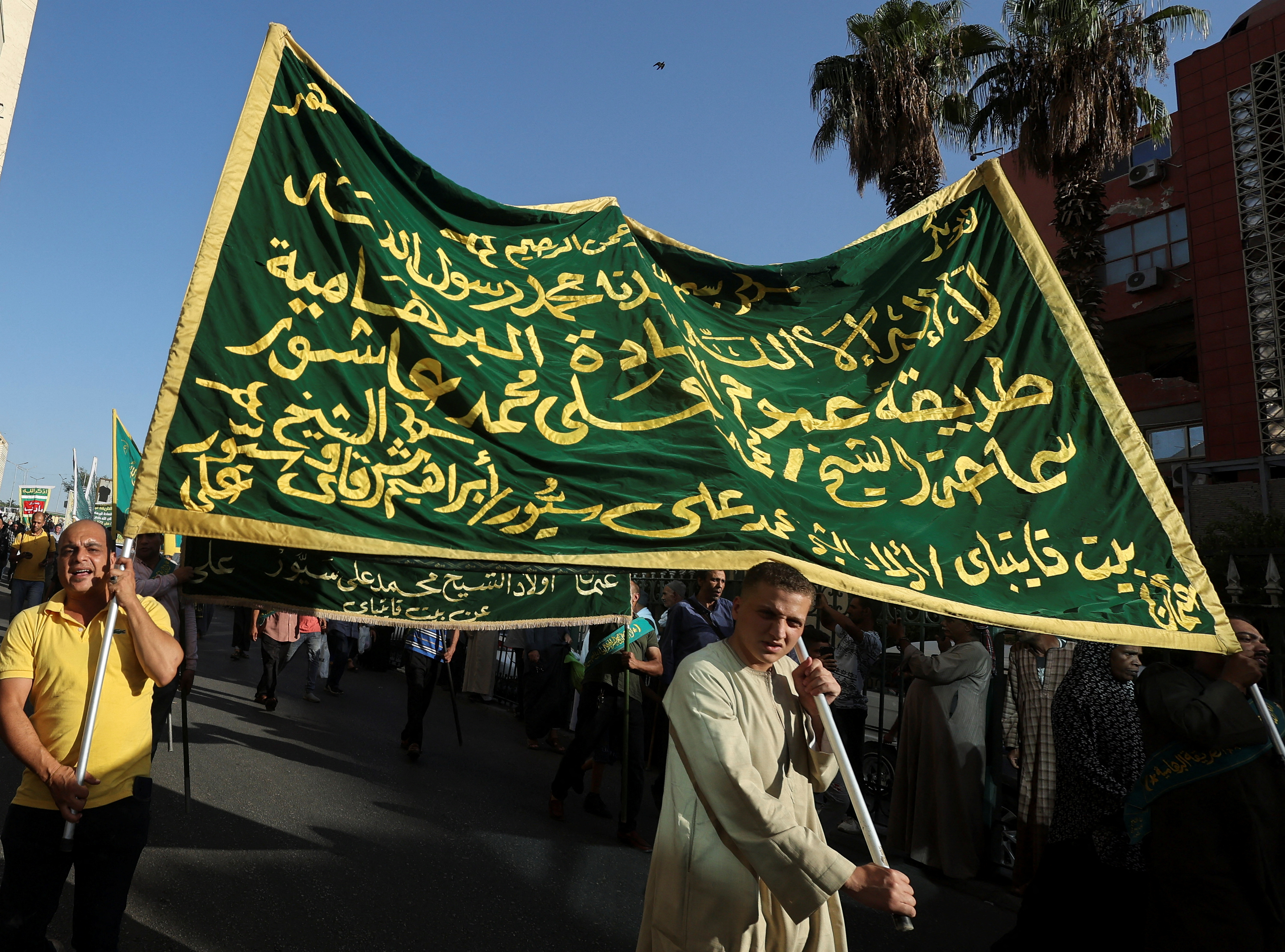 Sufi Muslims chant and march to celebrate "Mawlid al-Nabawi", or the birth of Prophet Mohammad, in Al Azhar district, Old Cairo, Egypt, September 27, 2023. REUTERS/Amr Abdallah Dalsh
