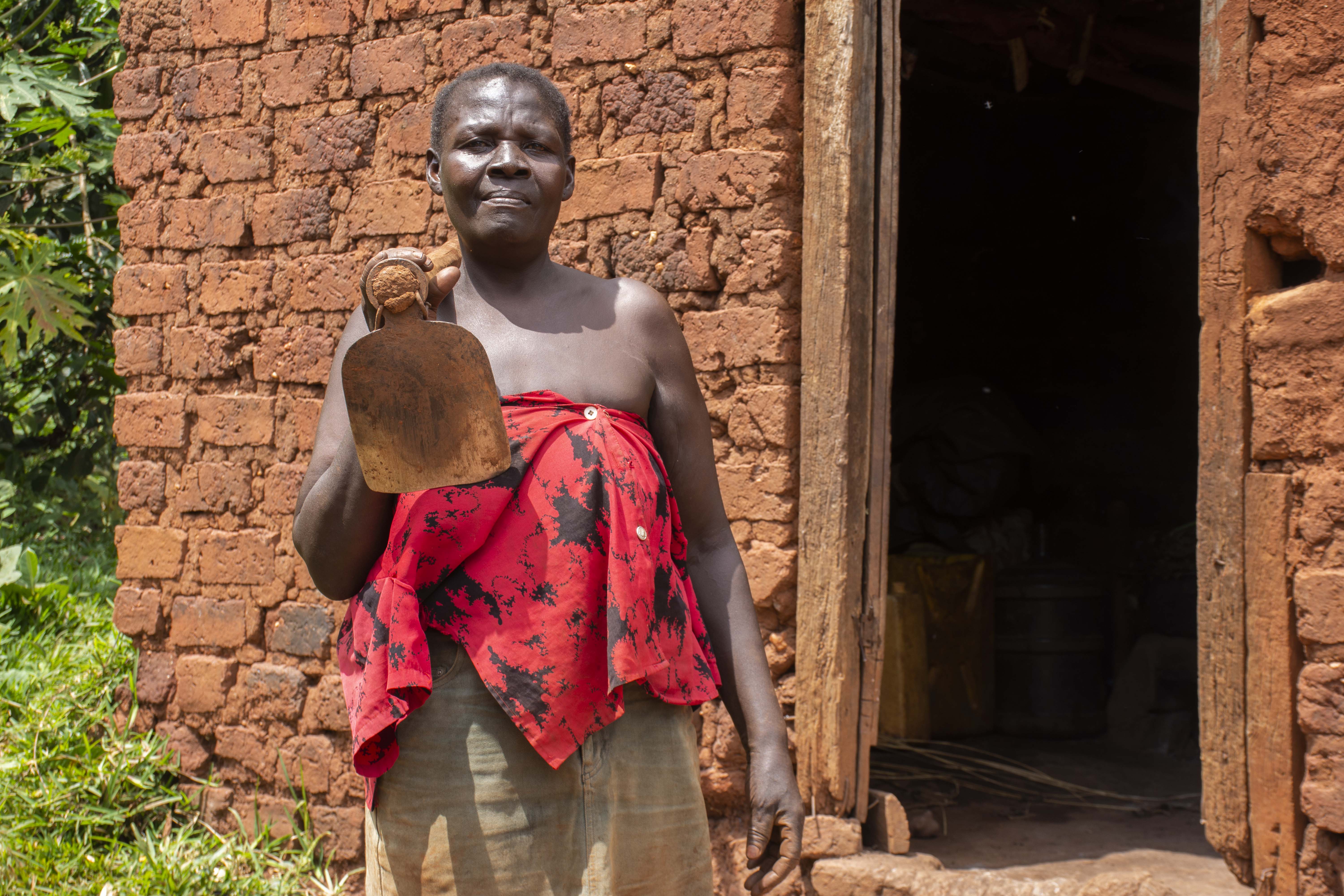 Florence Nakakande poses for a picture at her home in Namayumba, Uganda