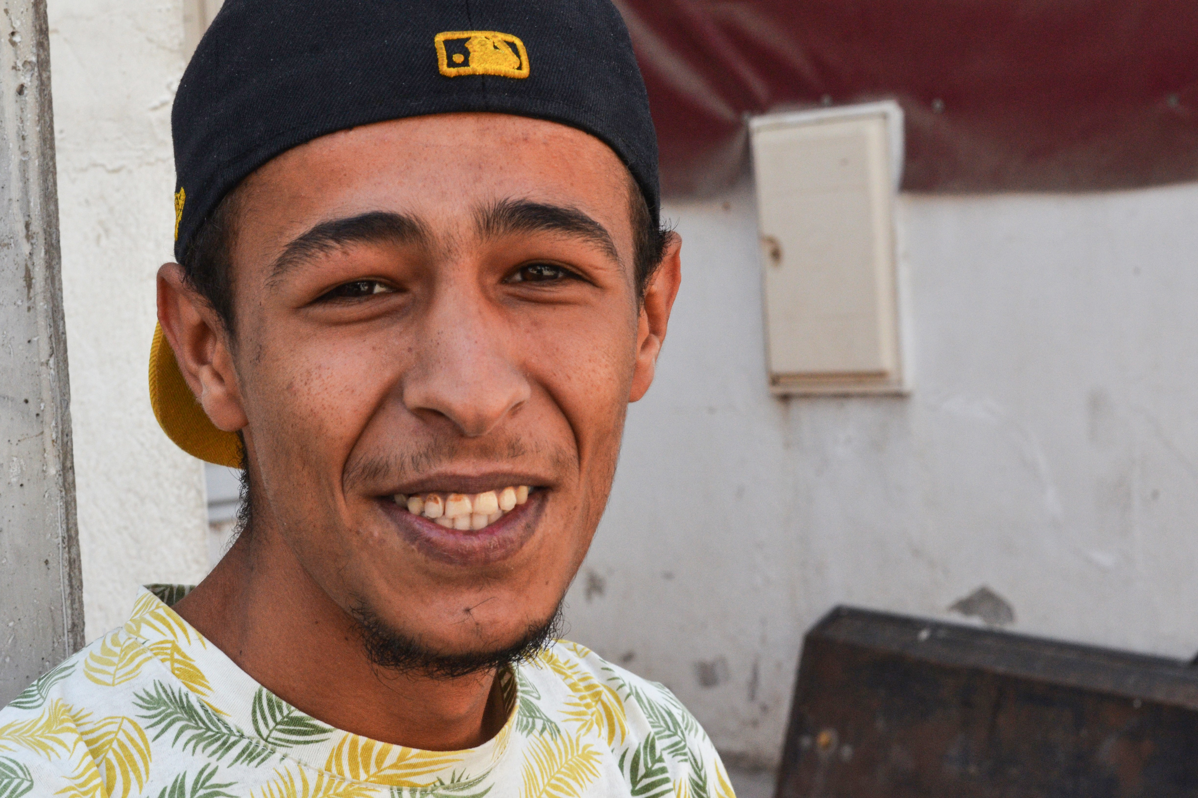 MOhamed smiles at the camera