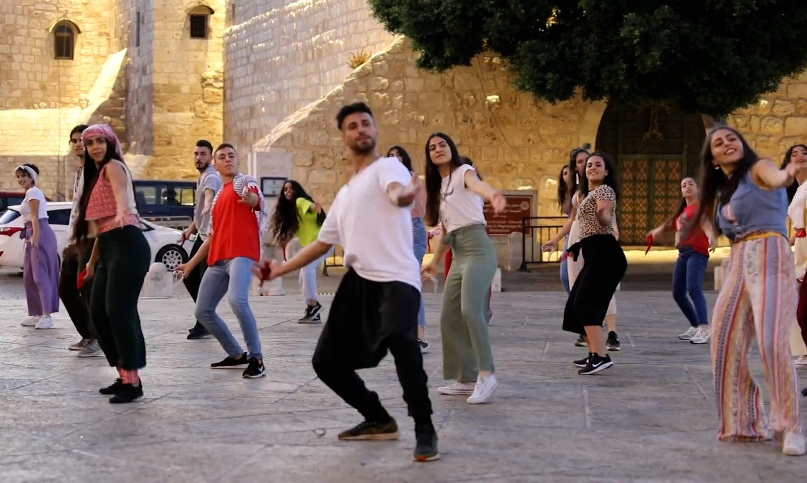 A group of dancers performing Afro-Dabke