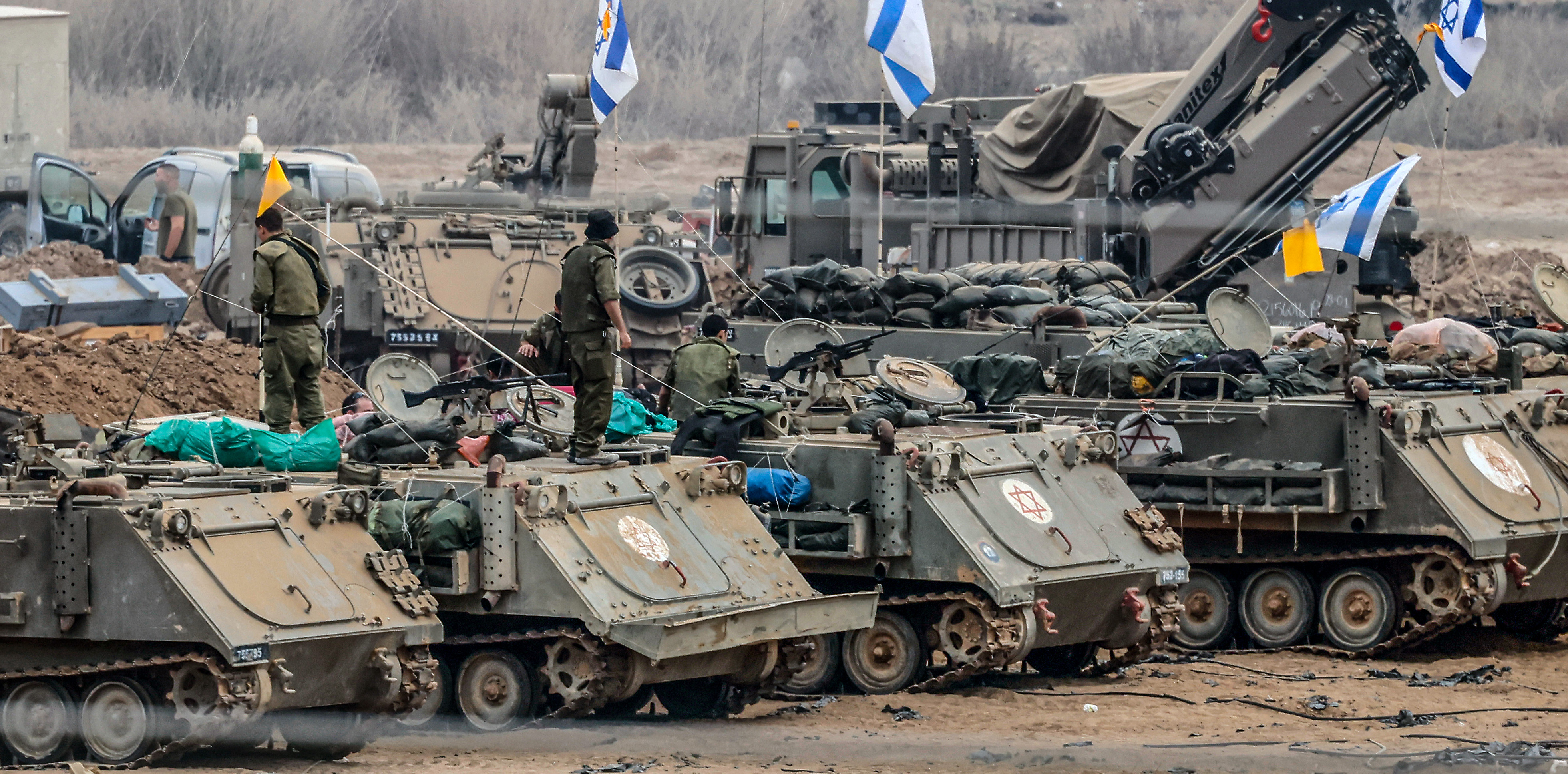 Israeli soldiers prepare for the scenario of ground maneuvers at an undisclosed location near the border with Gaza