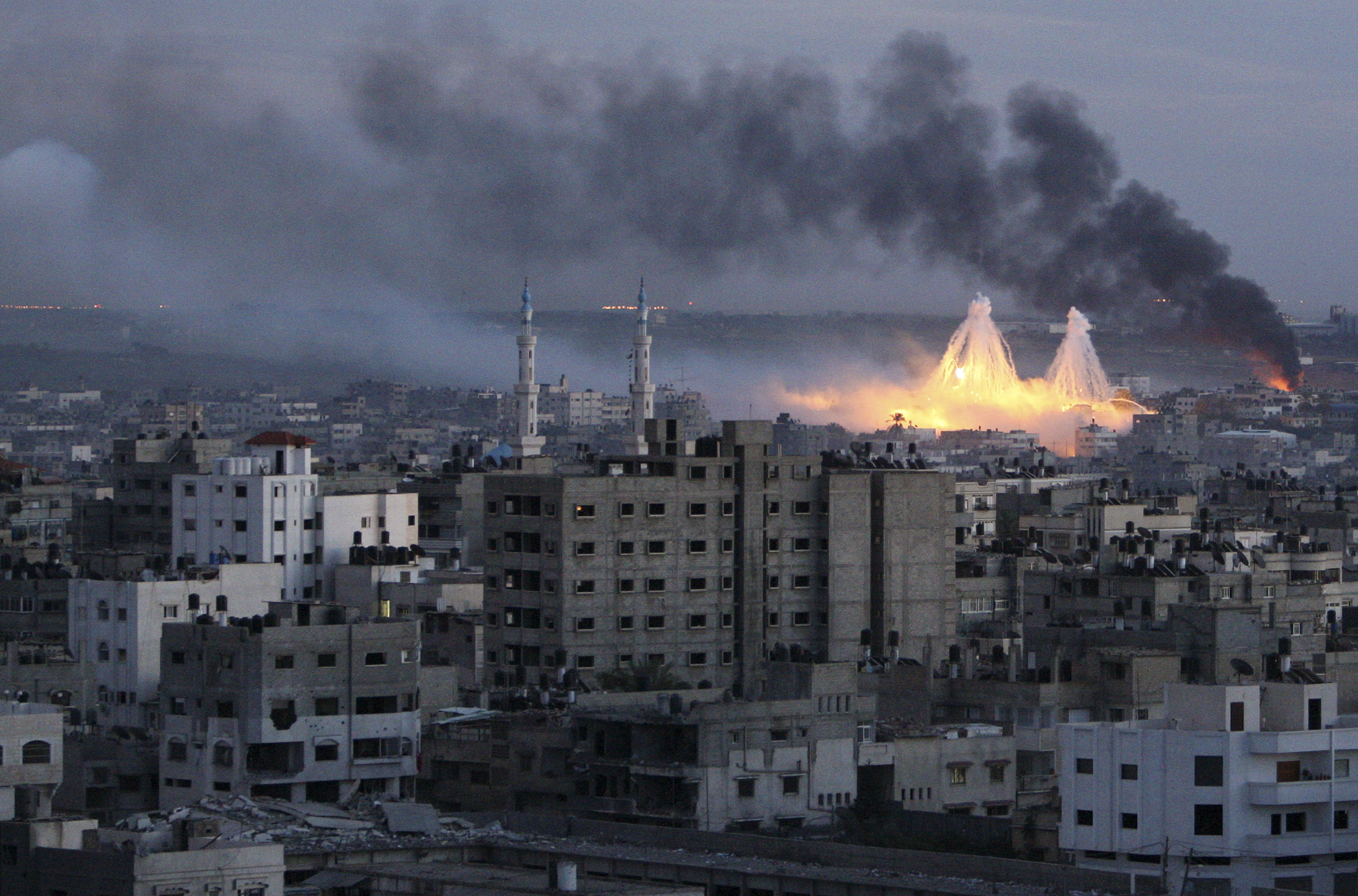 White phosphorus bombs explode over Gaza city during Israel's three week offensive, January 8, 2009