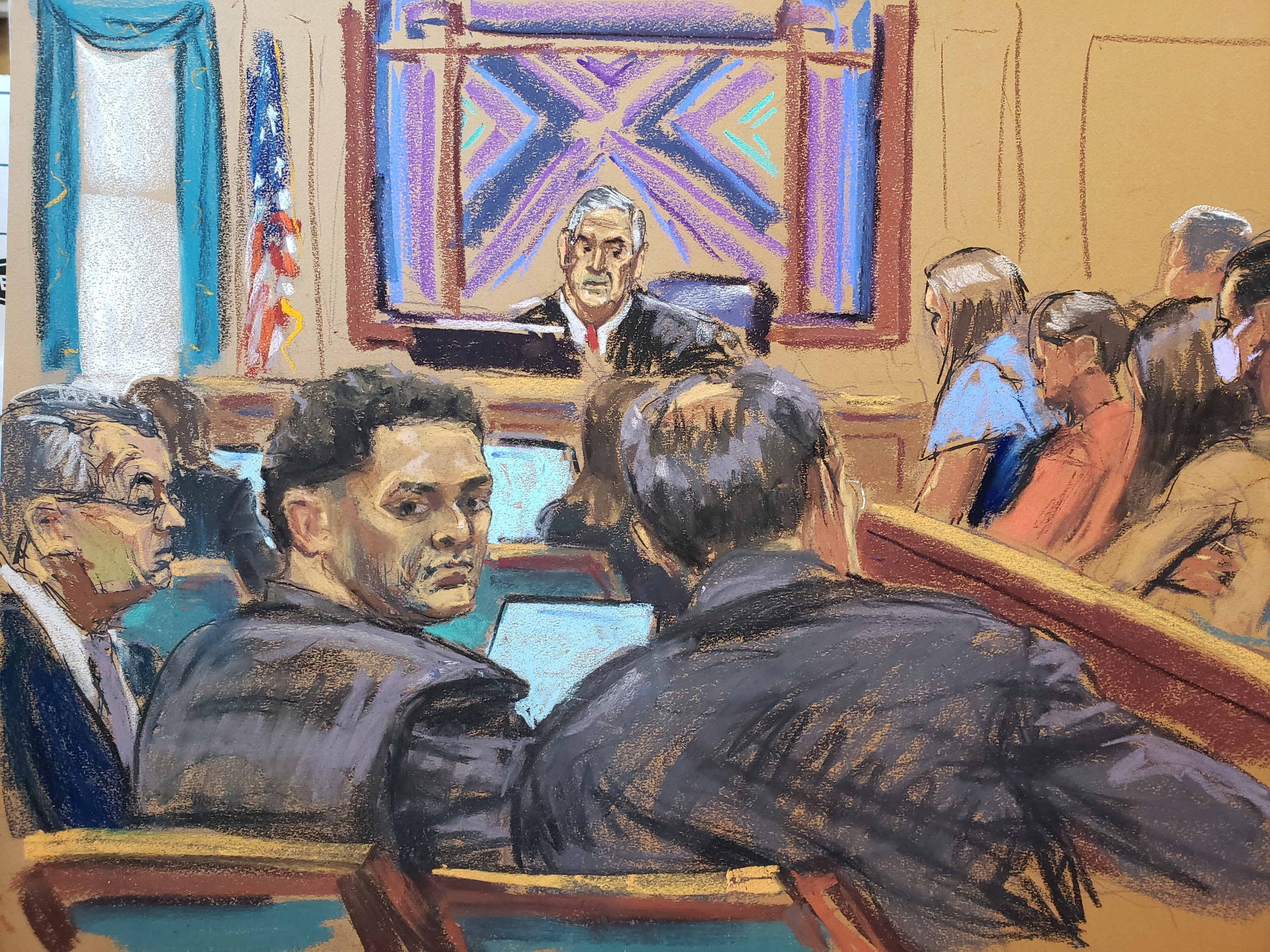 Sam Bankman-Fried sits beside his lawyer Christian Everdell on the first day of his fraud trial at a federal court in New York, US in this courtroom sketch