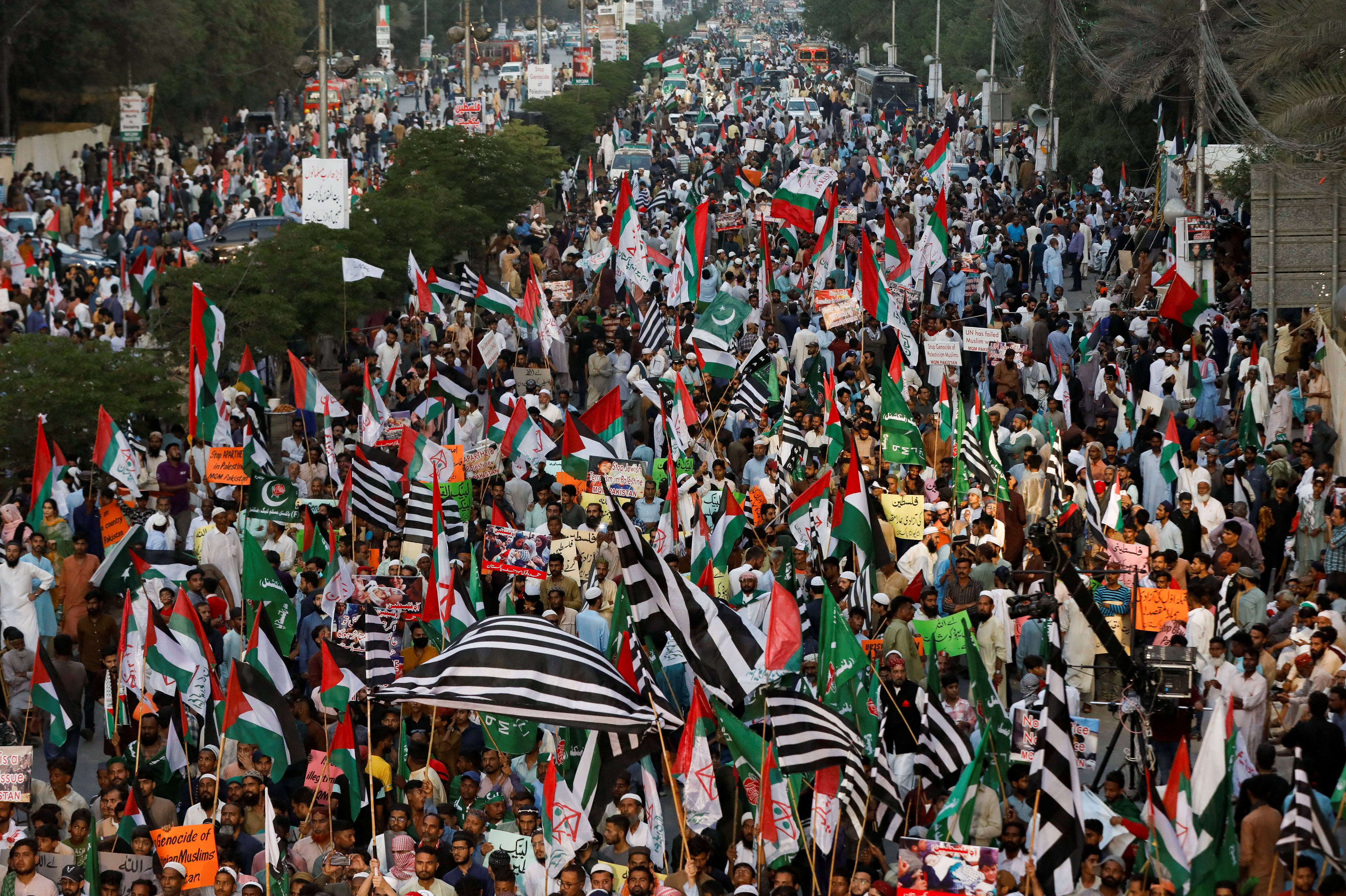 People gather in solidarity with Palestinians in Gaza, during a rally in Karachi, Pakistan