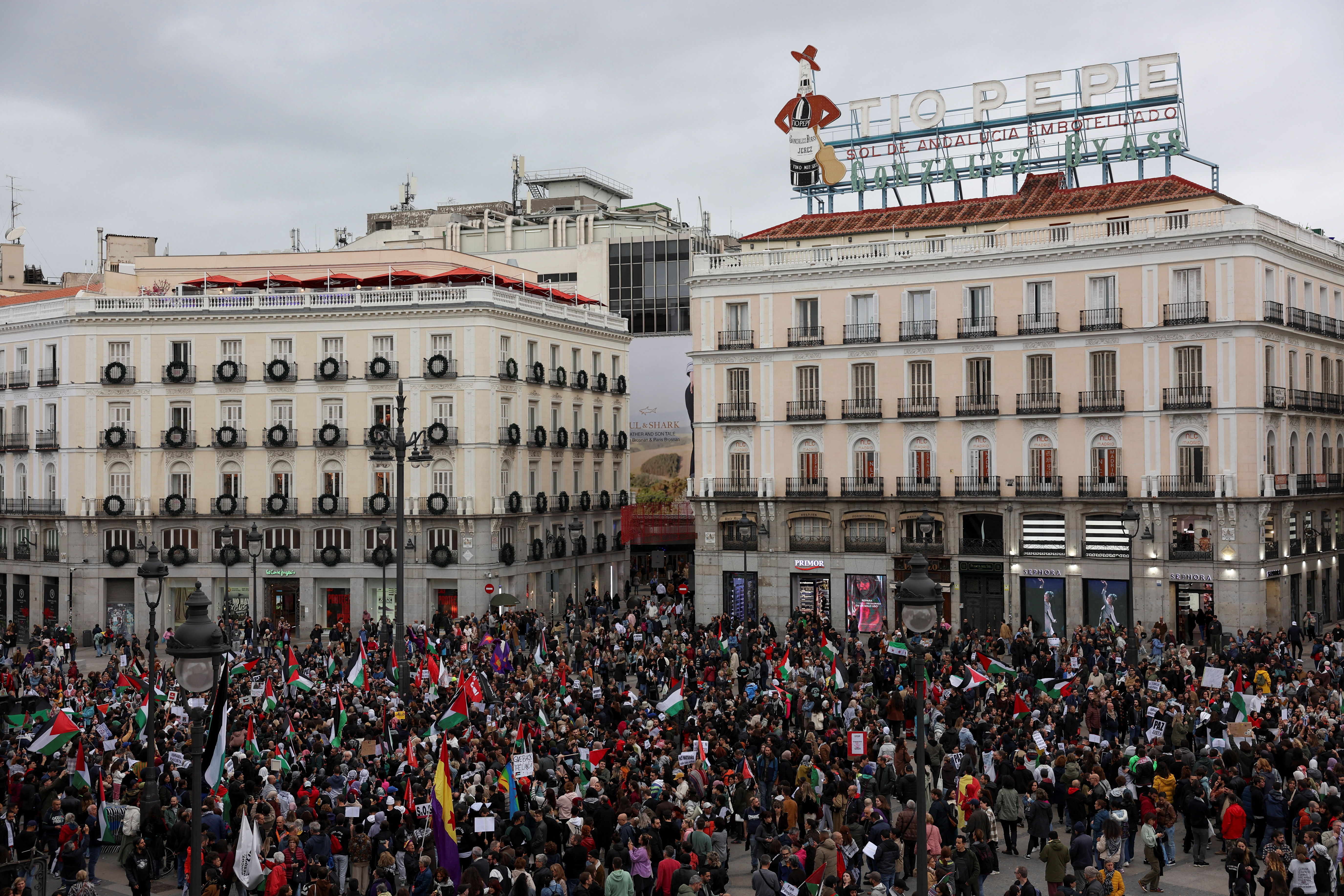 Demonstrators take part in a protest in support of Palestinians in Gaza, amid the ongoing conflict between Israel and the Palestinian Islamist group Hamas, in Madrid, Spain