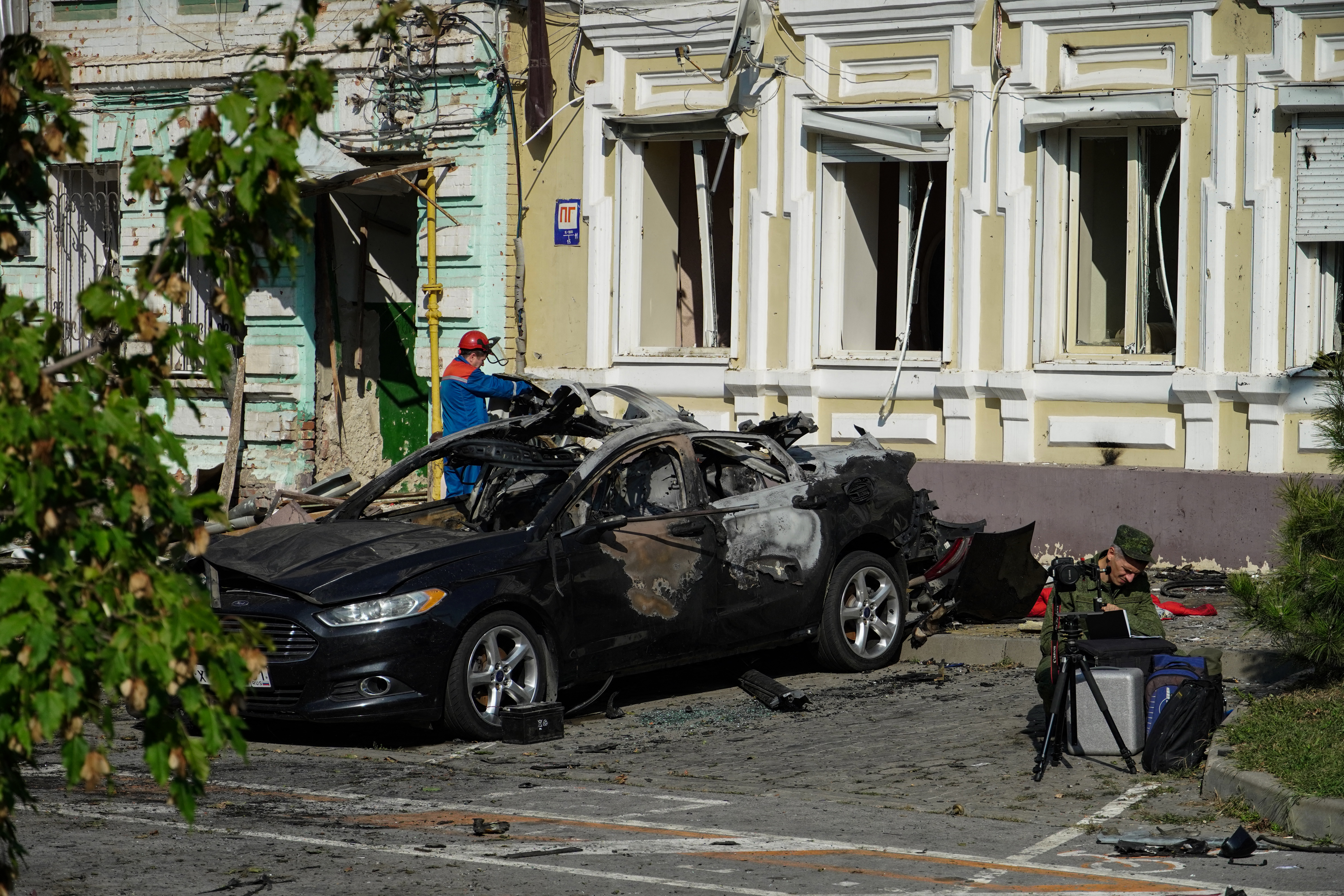 An investigator works at the site where a Ukrainian drone was downed by air defence system, in central Rostov-on-Don on September 7, 2023
