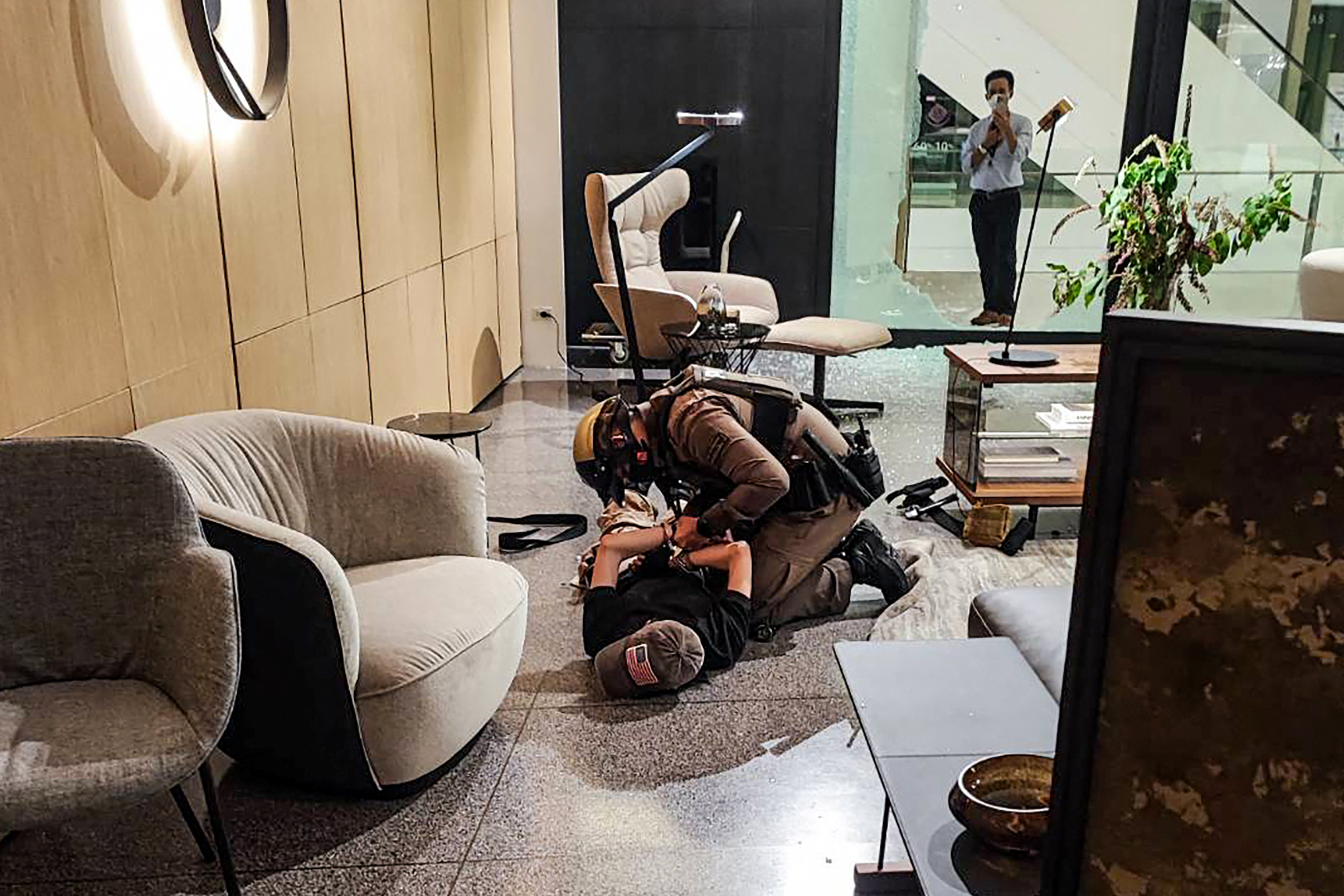 A 14-year-old suspect arrested after a shooting at Siam Paragon shopping centre in Bangkok