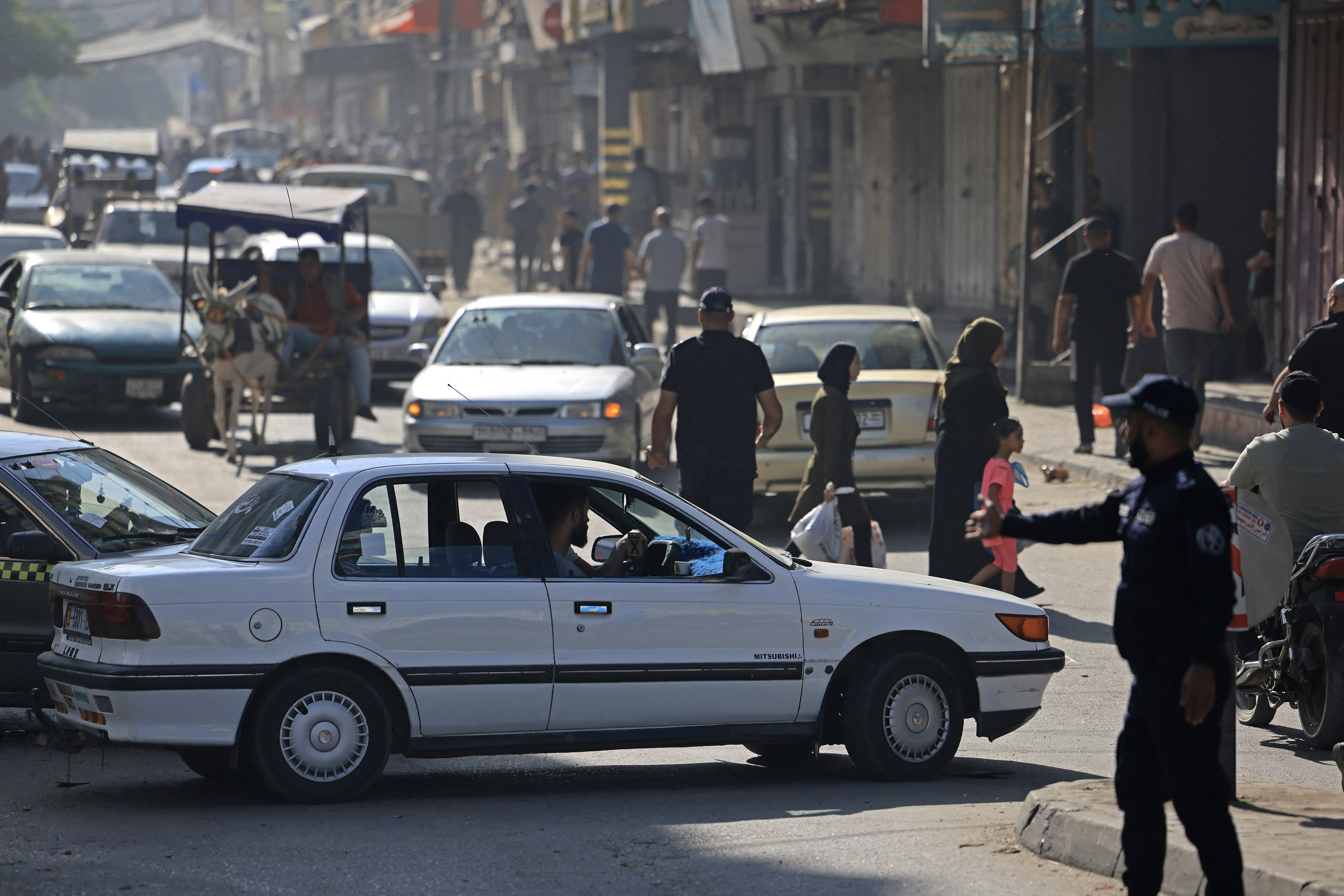 Residents in the Gaza Strip flee their homes