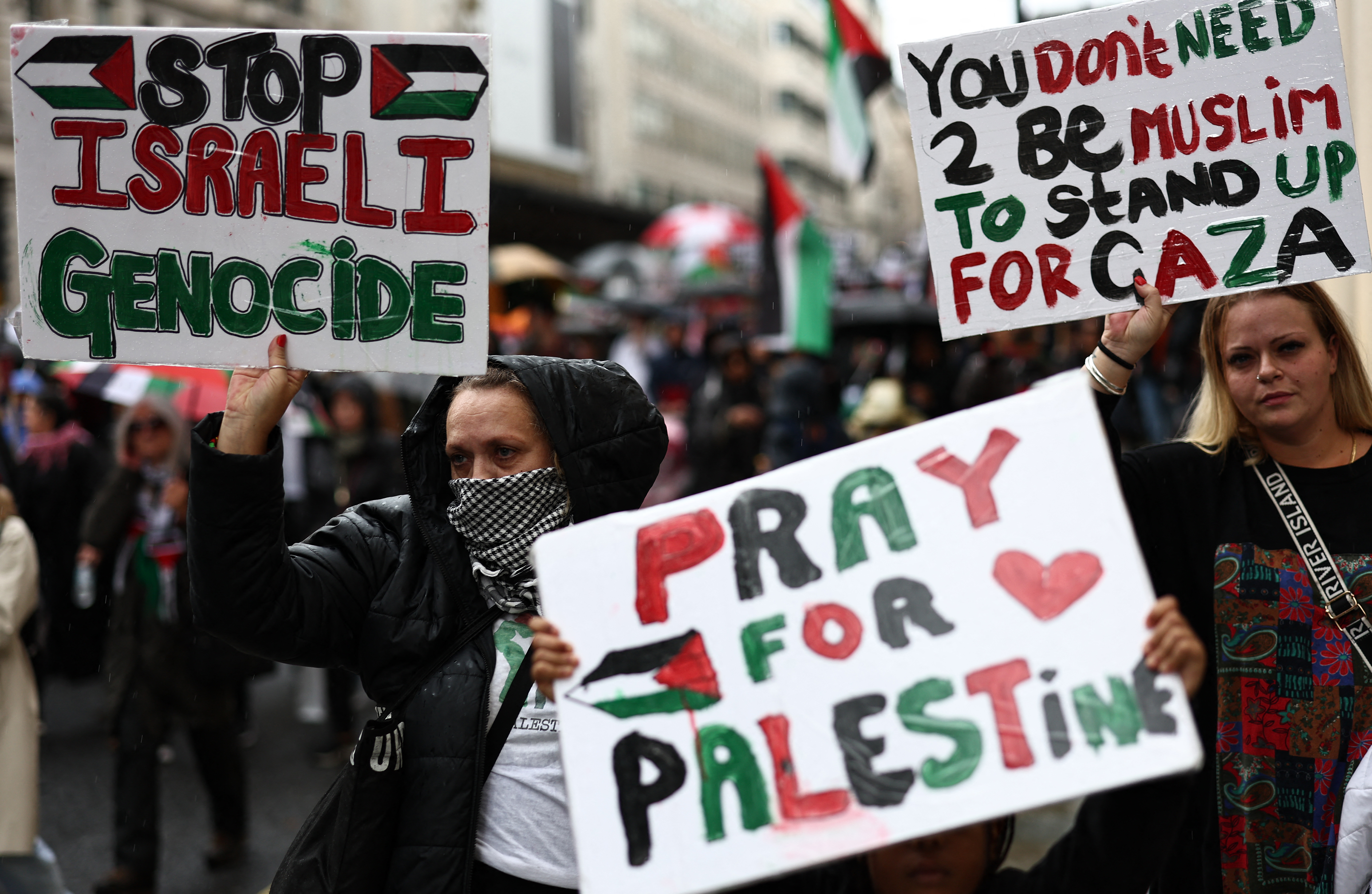 People take part in a 'March For Palestine', in London