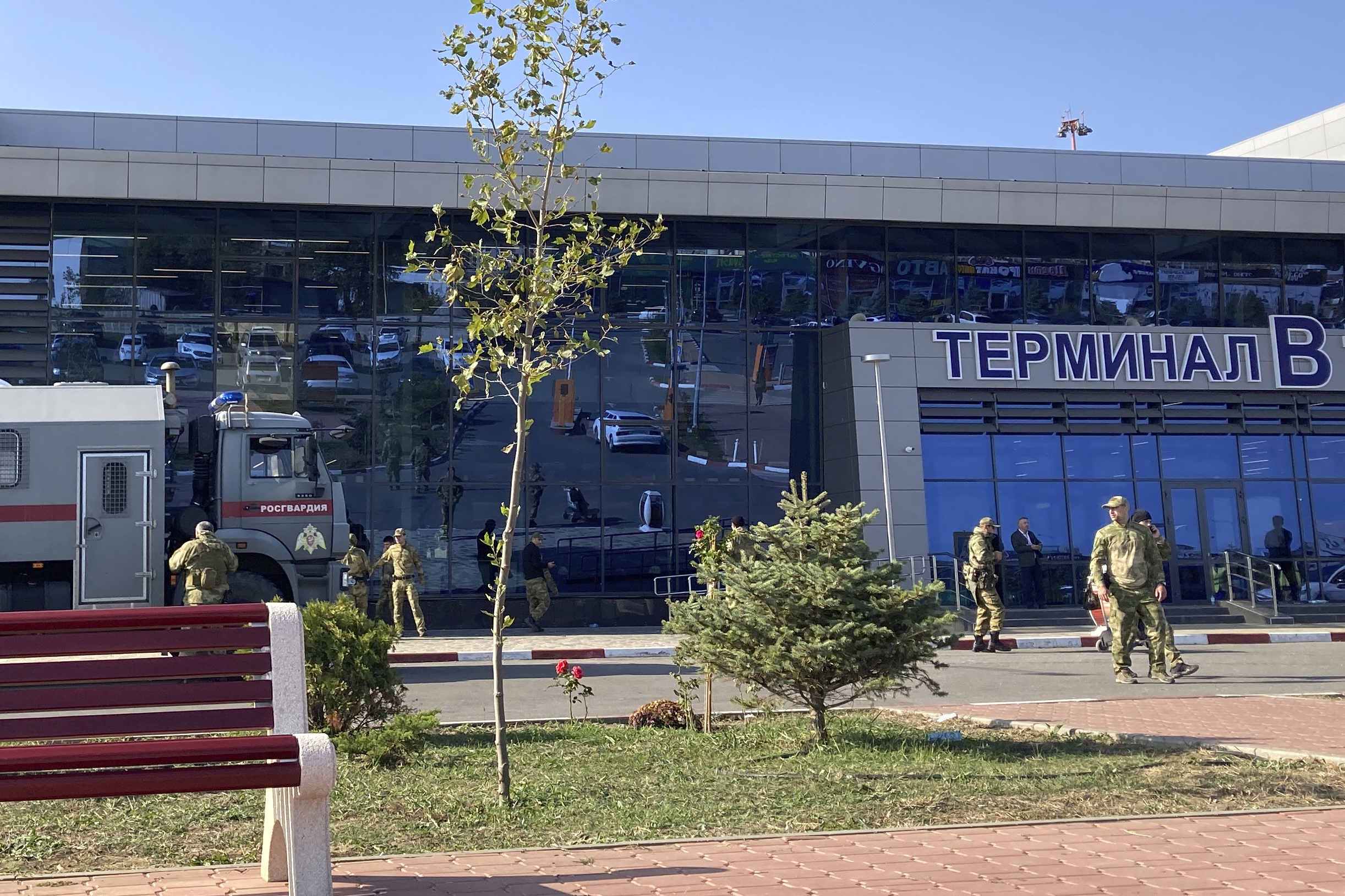 Law enforcement officers patrol an area outside the airport in Makhachkala on October 30, 2023. - Russian police on October 30, 2023 said they had arrested 60 people suspected of storming an airport in the Muslim-majority Caucasus republic of Dagestan, seeking to attack Jewish passengers coming from Israel. (Photo by STRINGER / AFP)