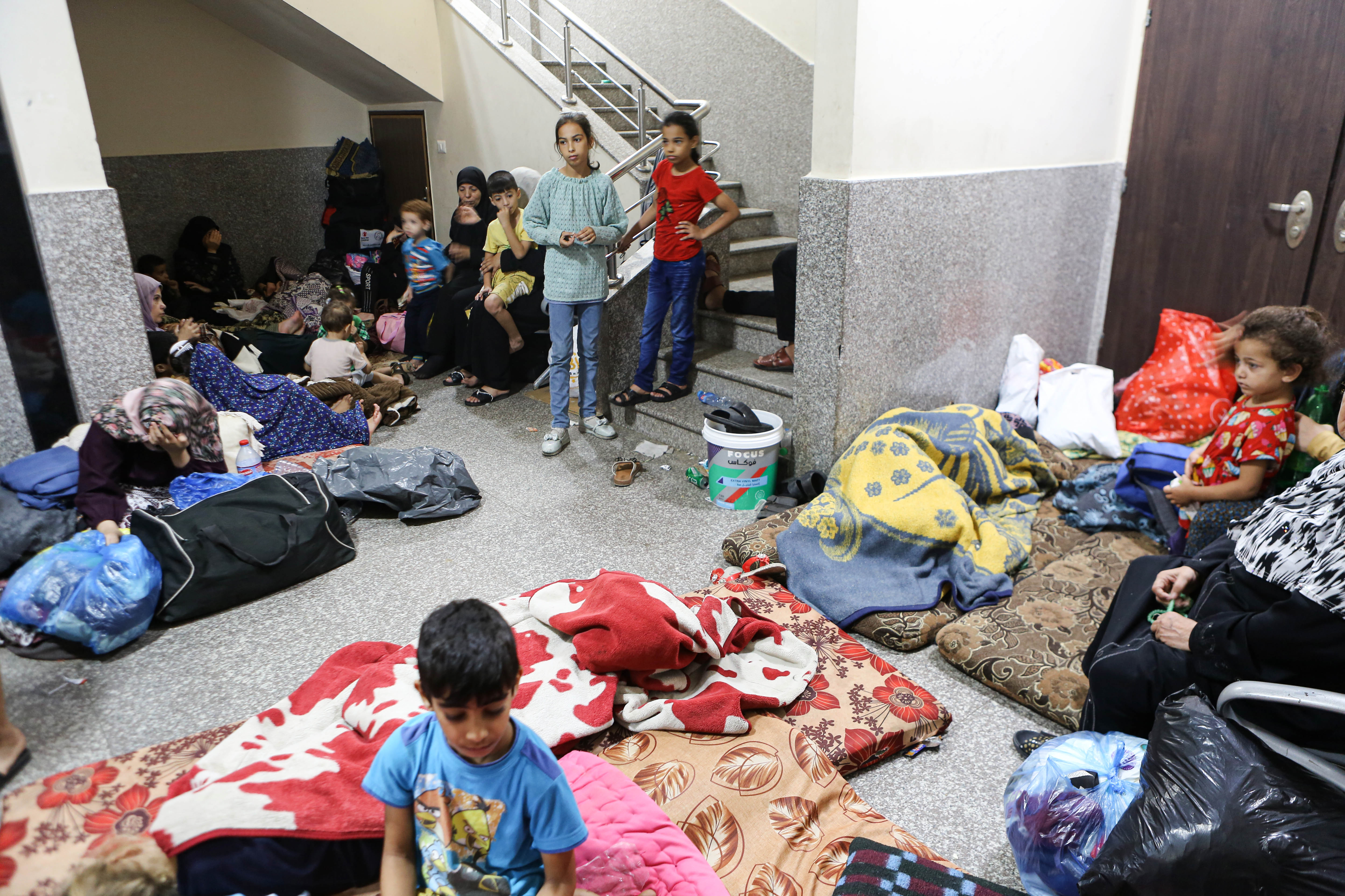 Displaced Palestinians staying the Shifa Hospital grounds