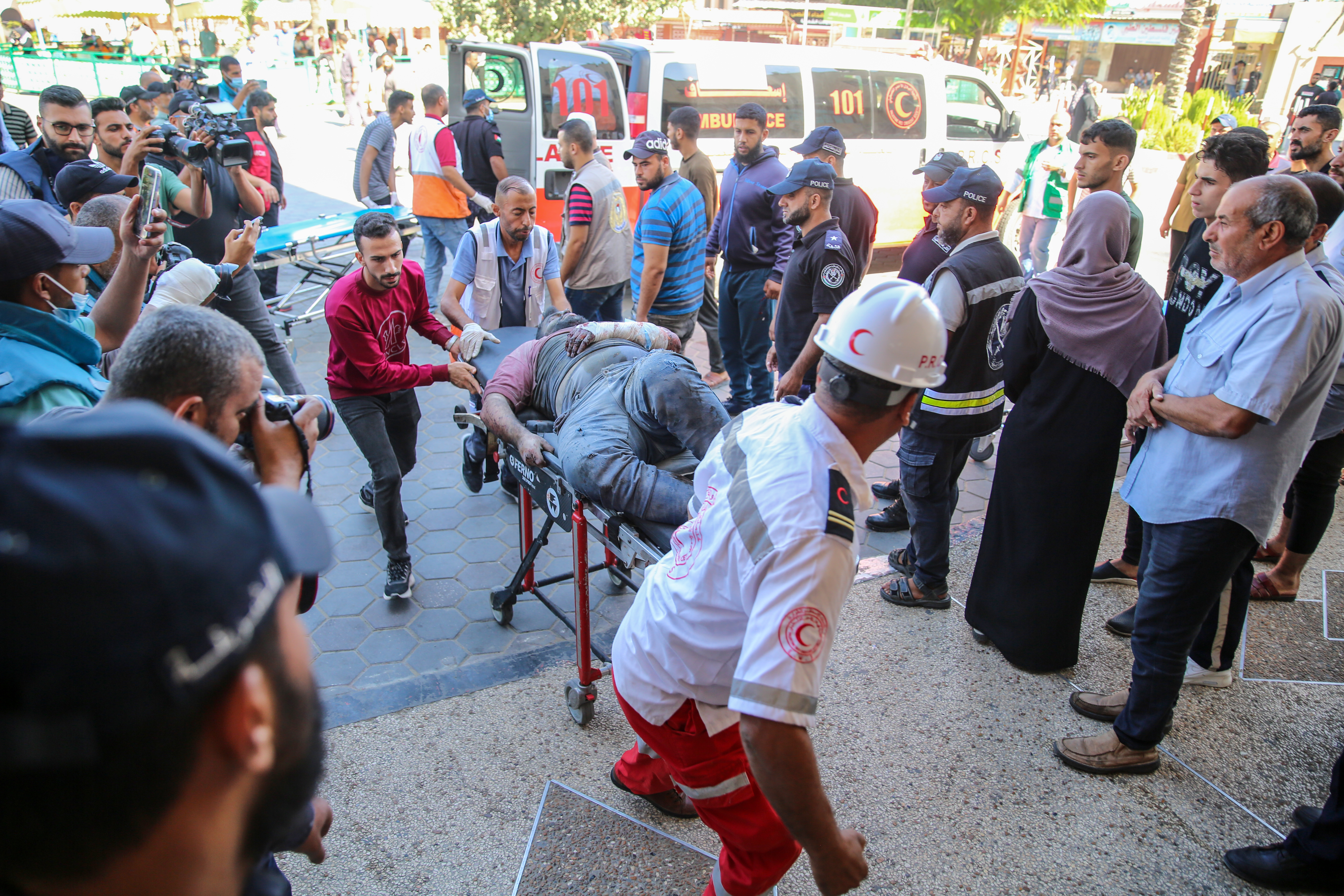 An injured person is received at the al-Aqsa Martyrs Hospital in Deir al-Balah, central Gaza Strip 