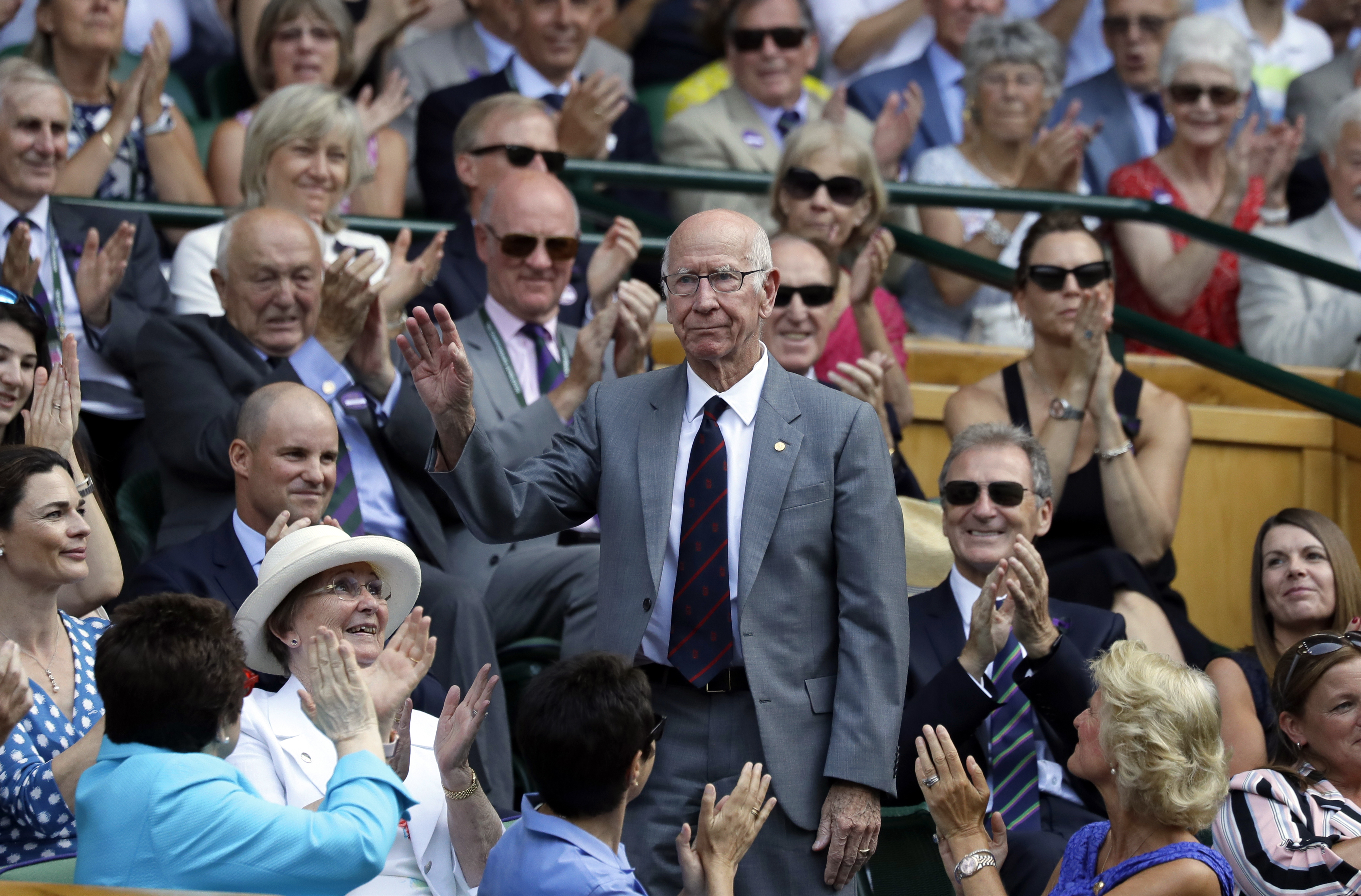 Bobby Charlton waves to the crowd