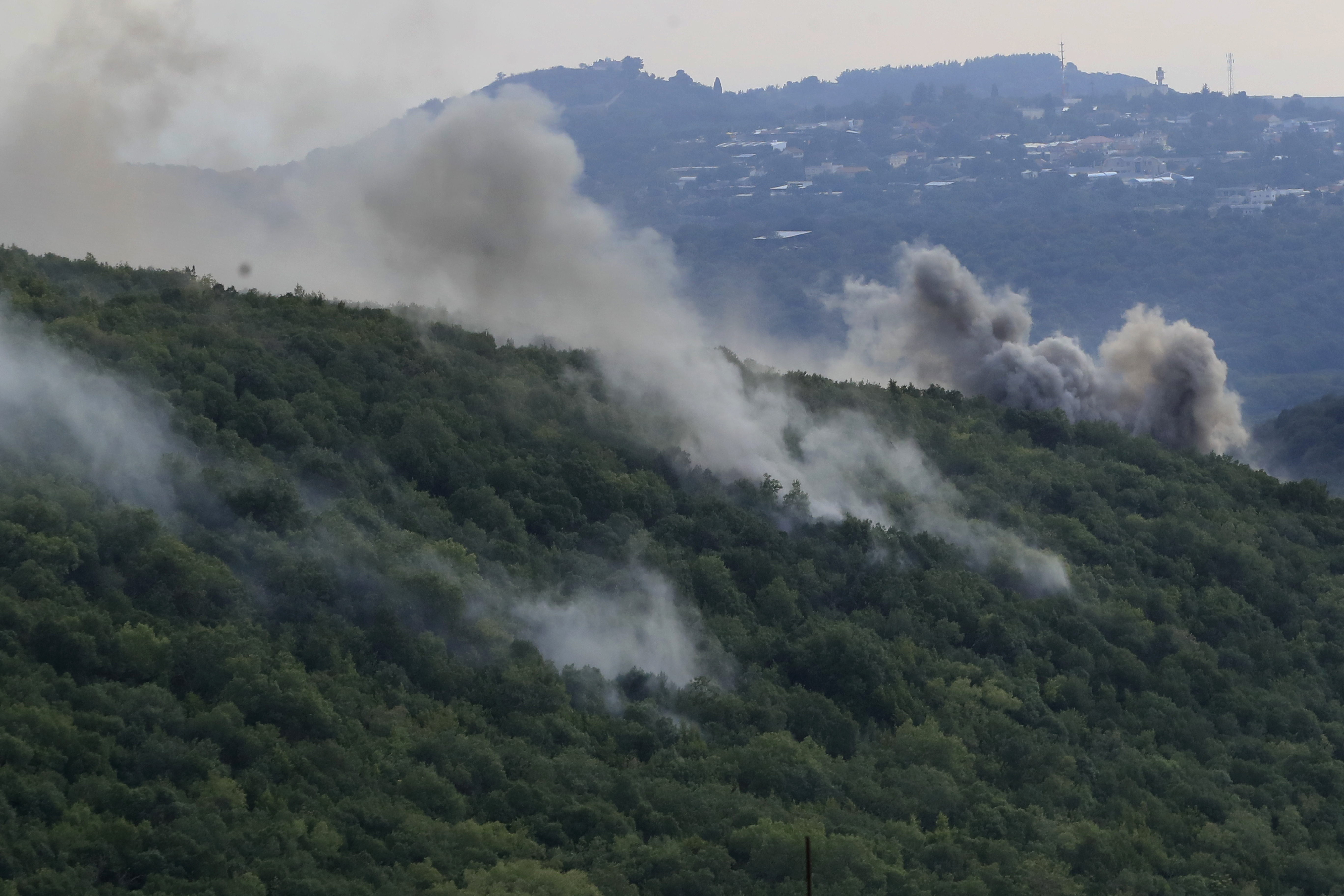 Smoke rises from Israeli shelling, in the Aita al-Shaab village, south Lebanon, Monday, Oct. 9, 2023.