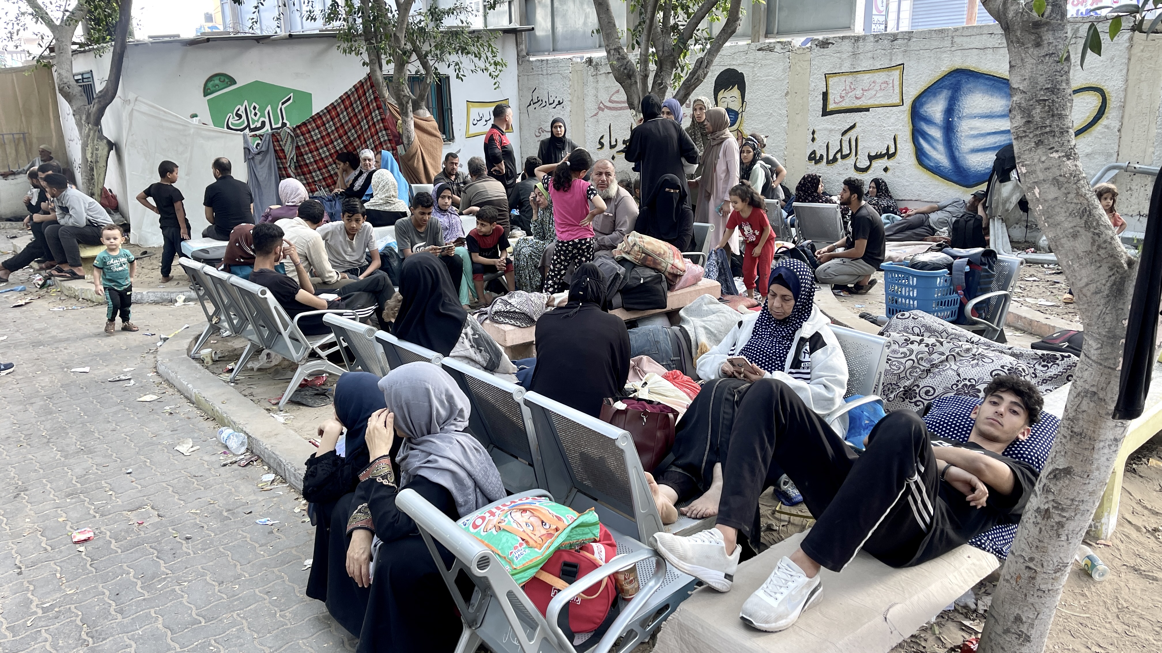 Displaced Palestinians staying the Shifa Hospital grounds