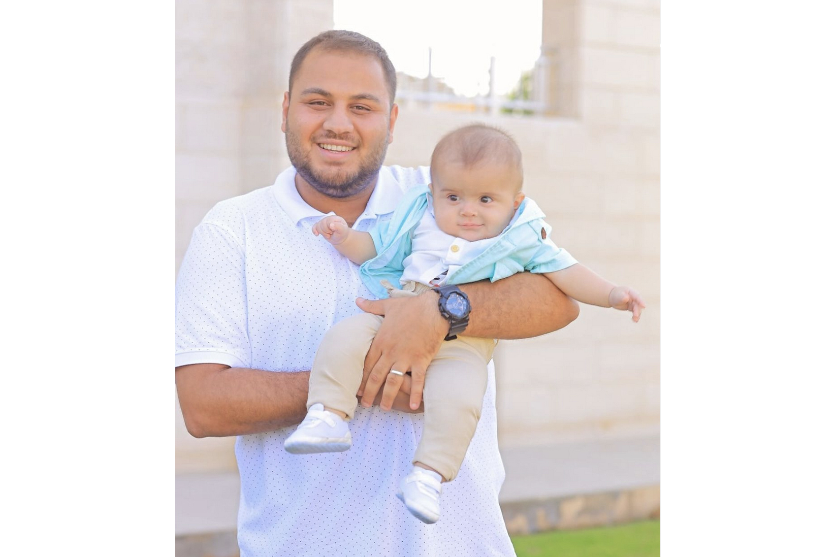 Hamza with his nephew Adam