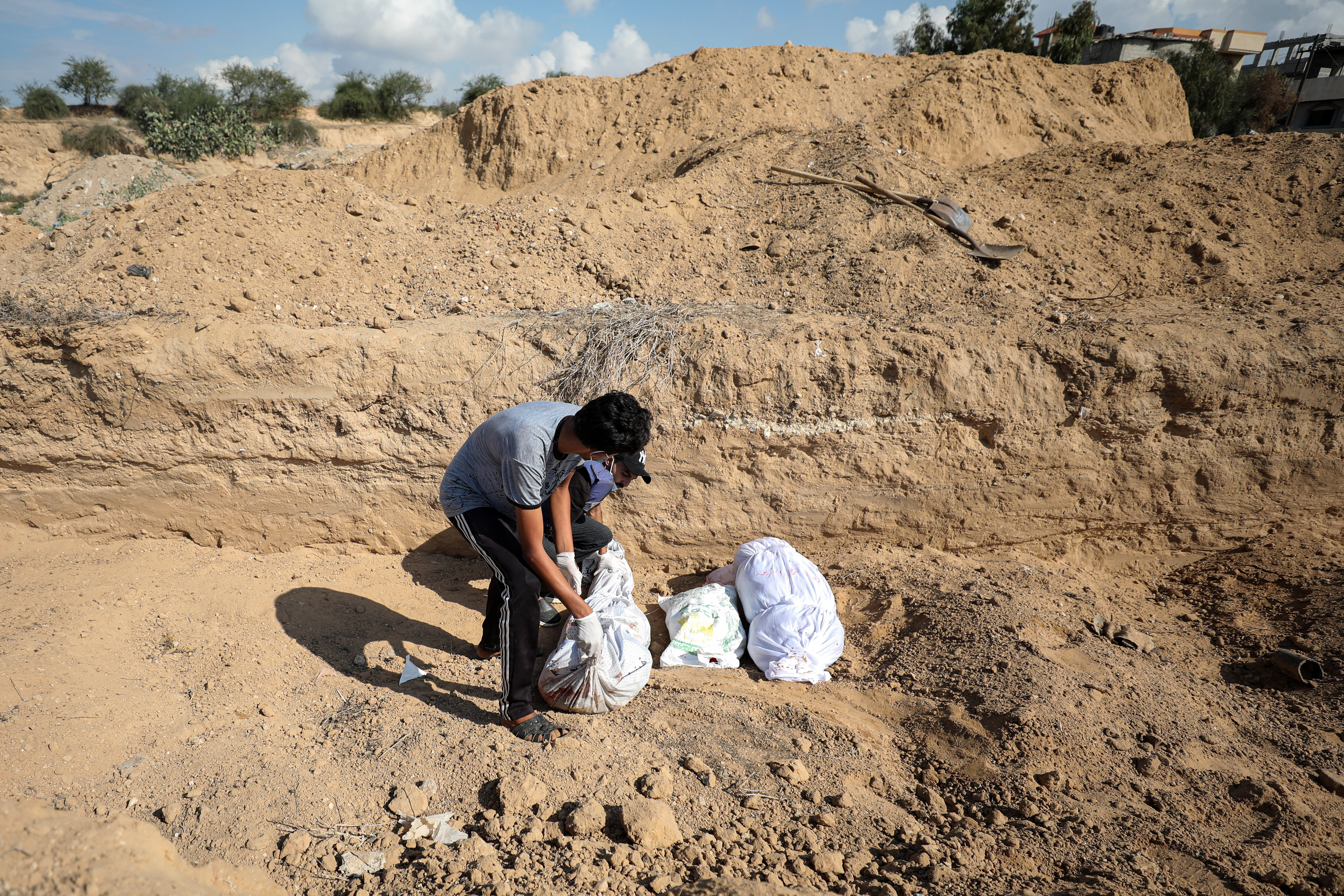 Torn remains, burned beyond recognition: Burying Gaza's unknown bodies