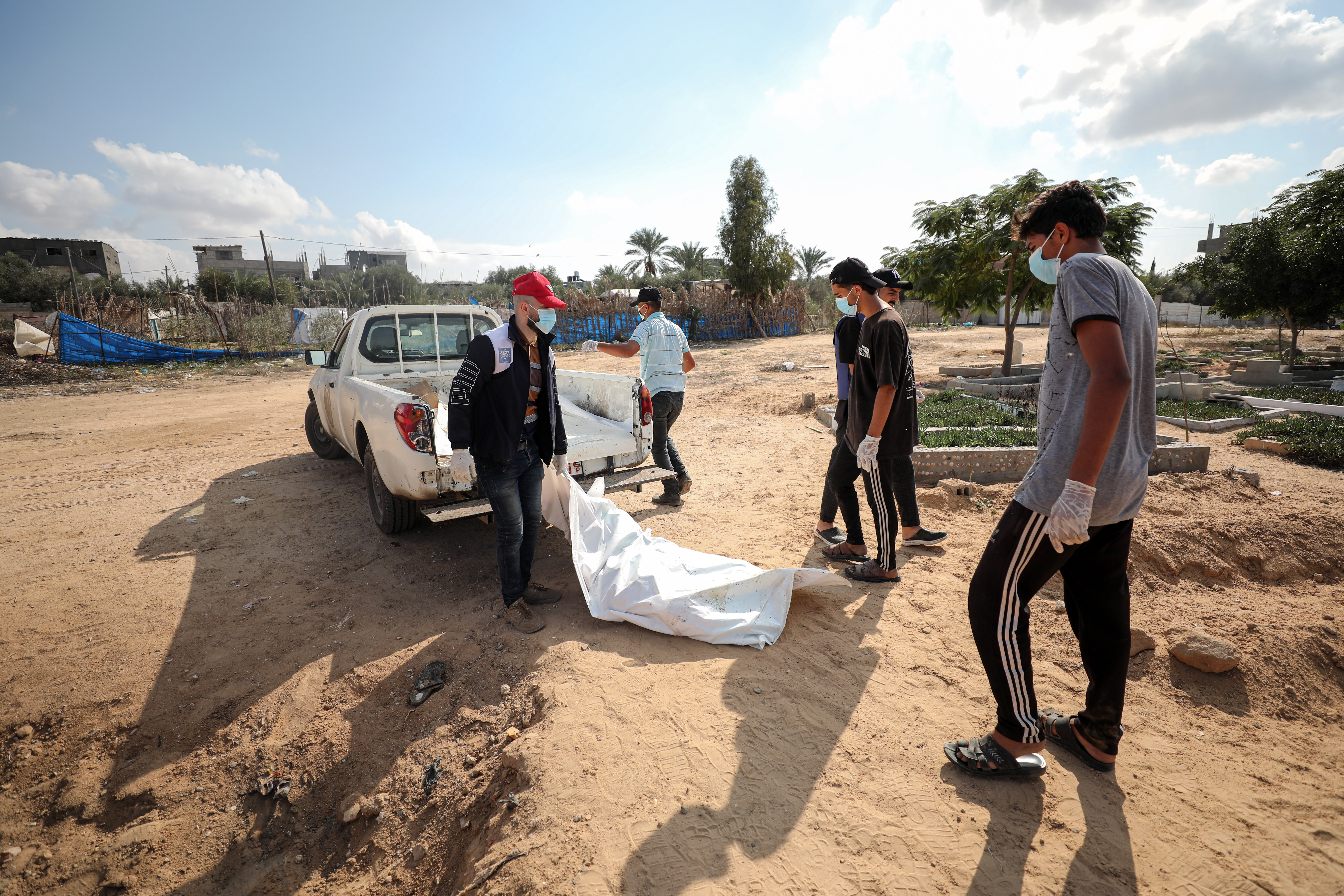 Torn remains, burned beyond recognition: Burying Gaza's unknown bodies