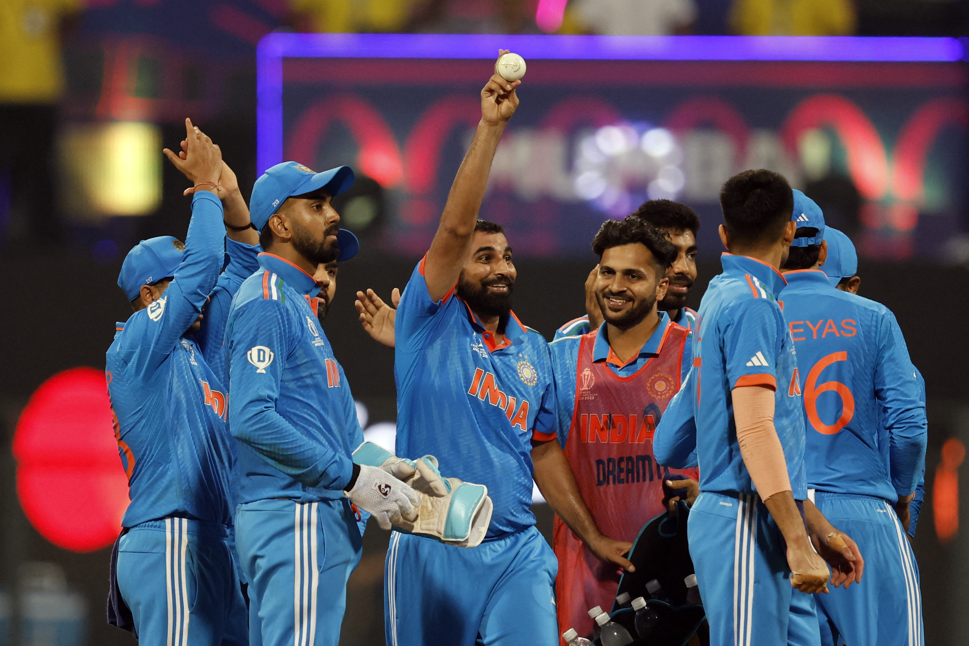 India's Mohammed Shami celebrates his five-wicket-haul after taking the wicket of Sri Lanka's Kasun Rajitha