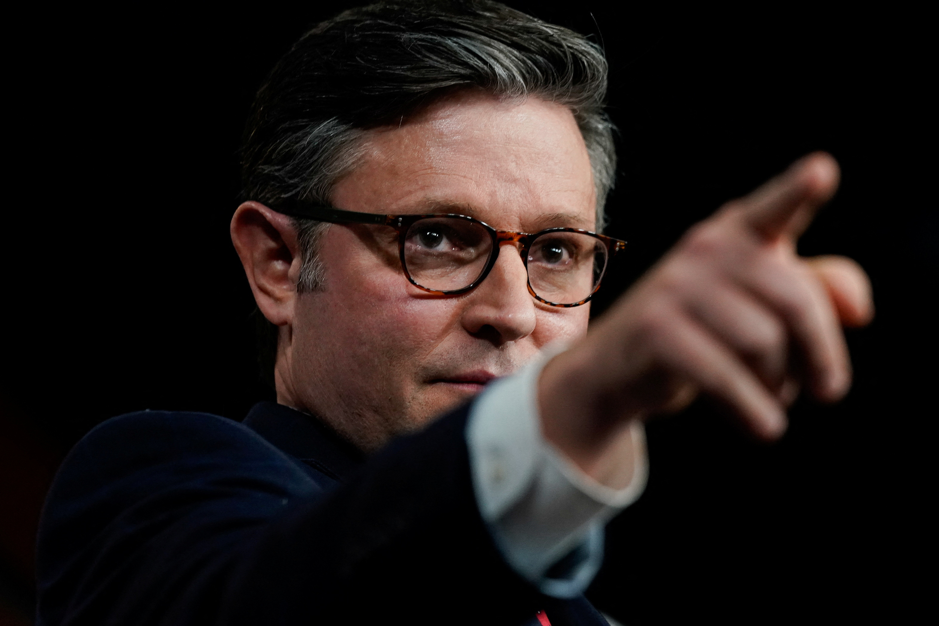 US House Speaker Mike Johnson. He is pointing.