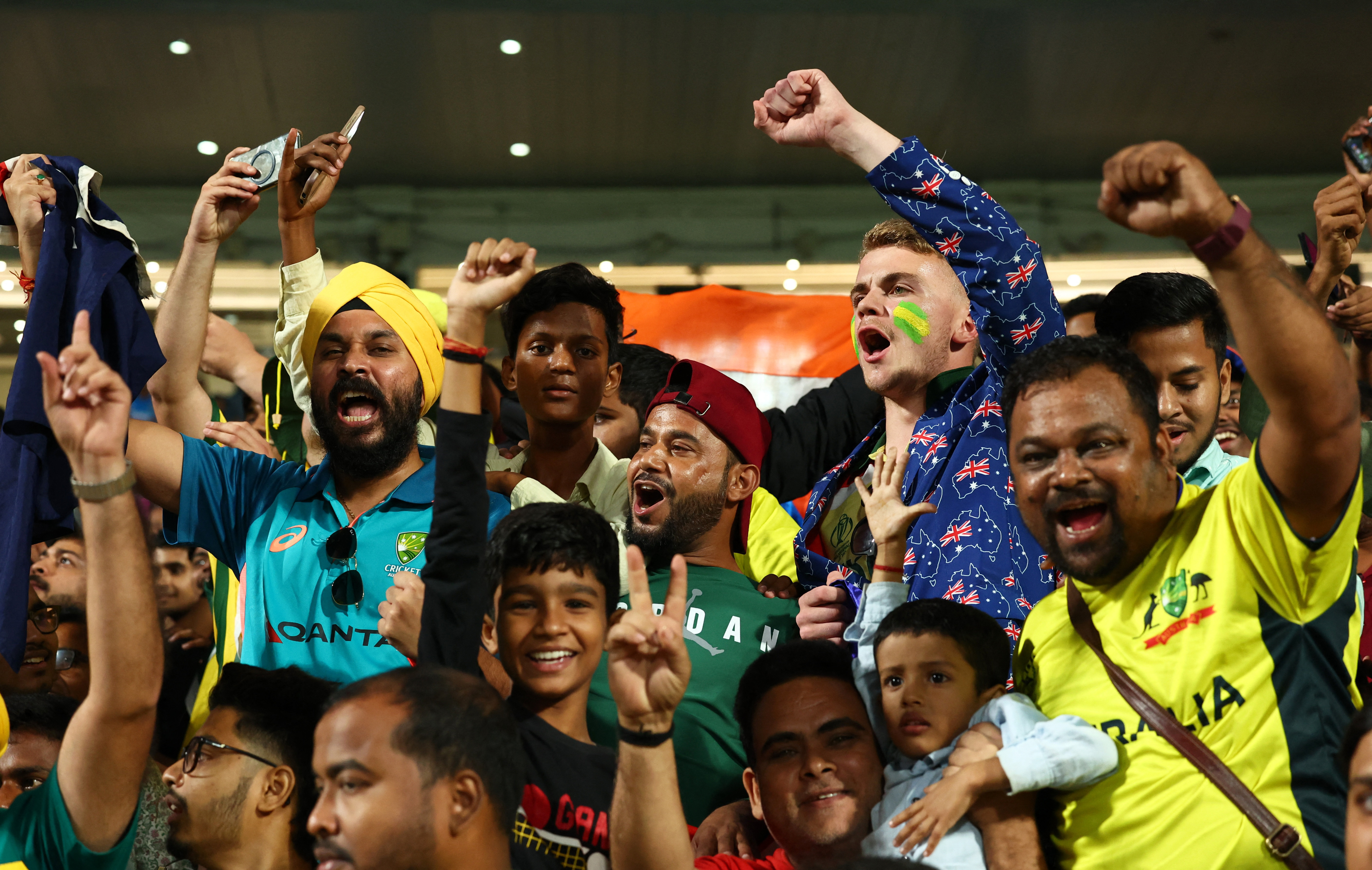 Fans cheer after the match