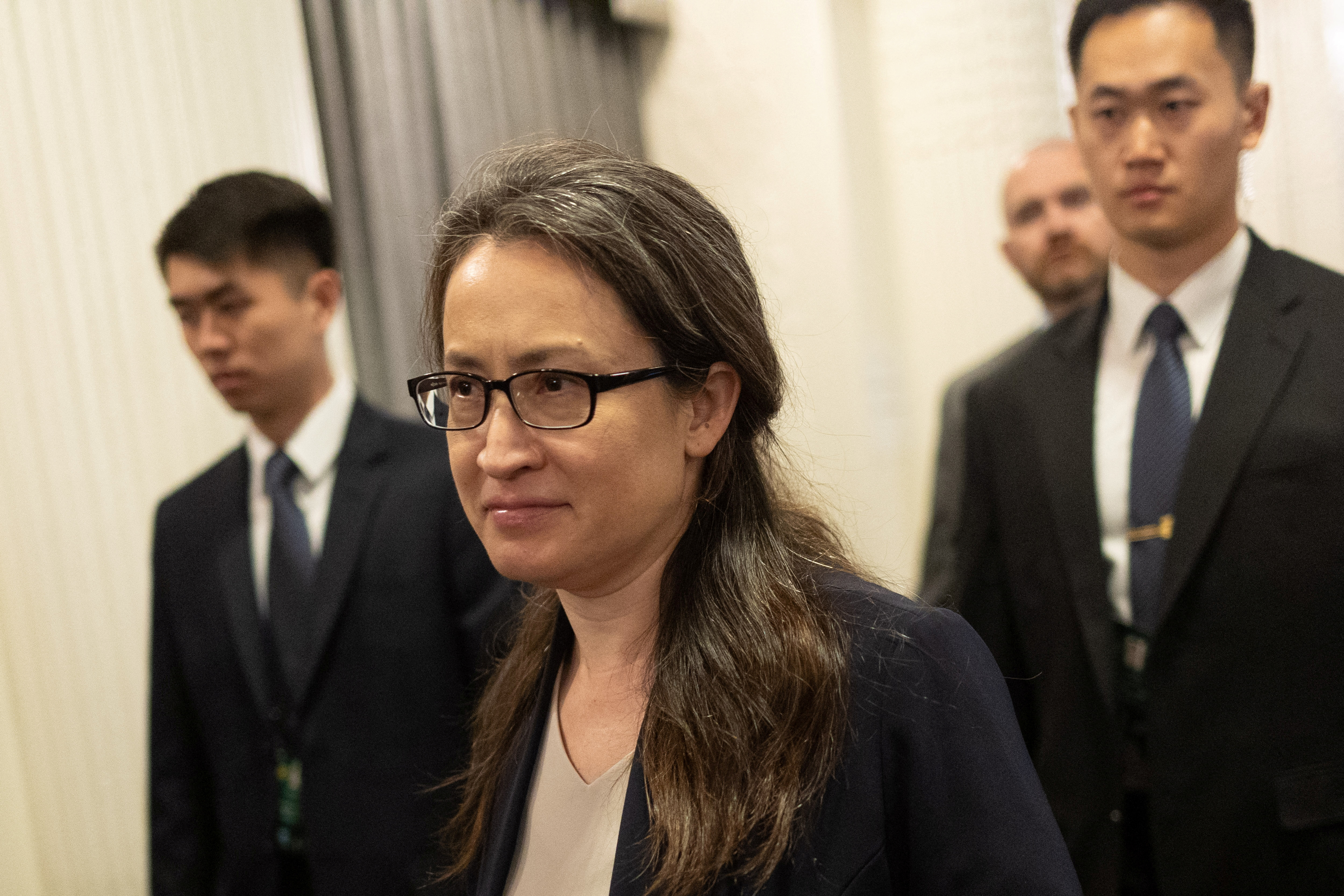 Taiwan's top representative in the U.S., Hsiao Bi-khim. She is walking and smiling.