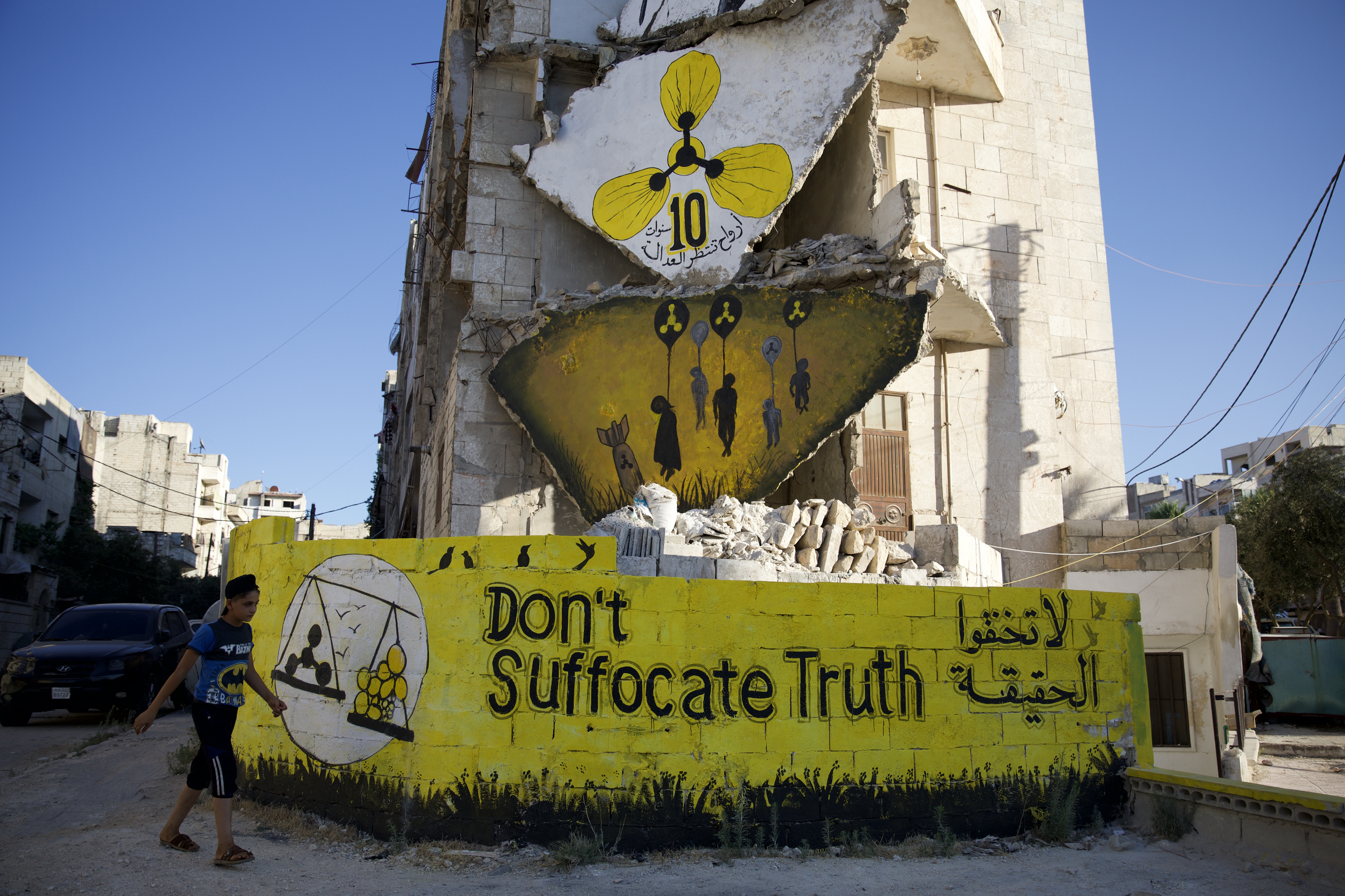 White Helmets members commemorate victims of chemical weapons attacks