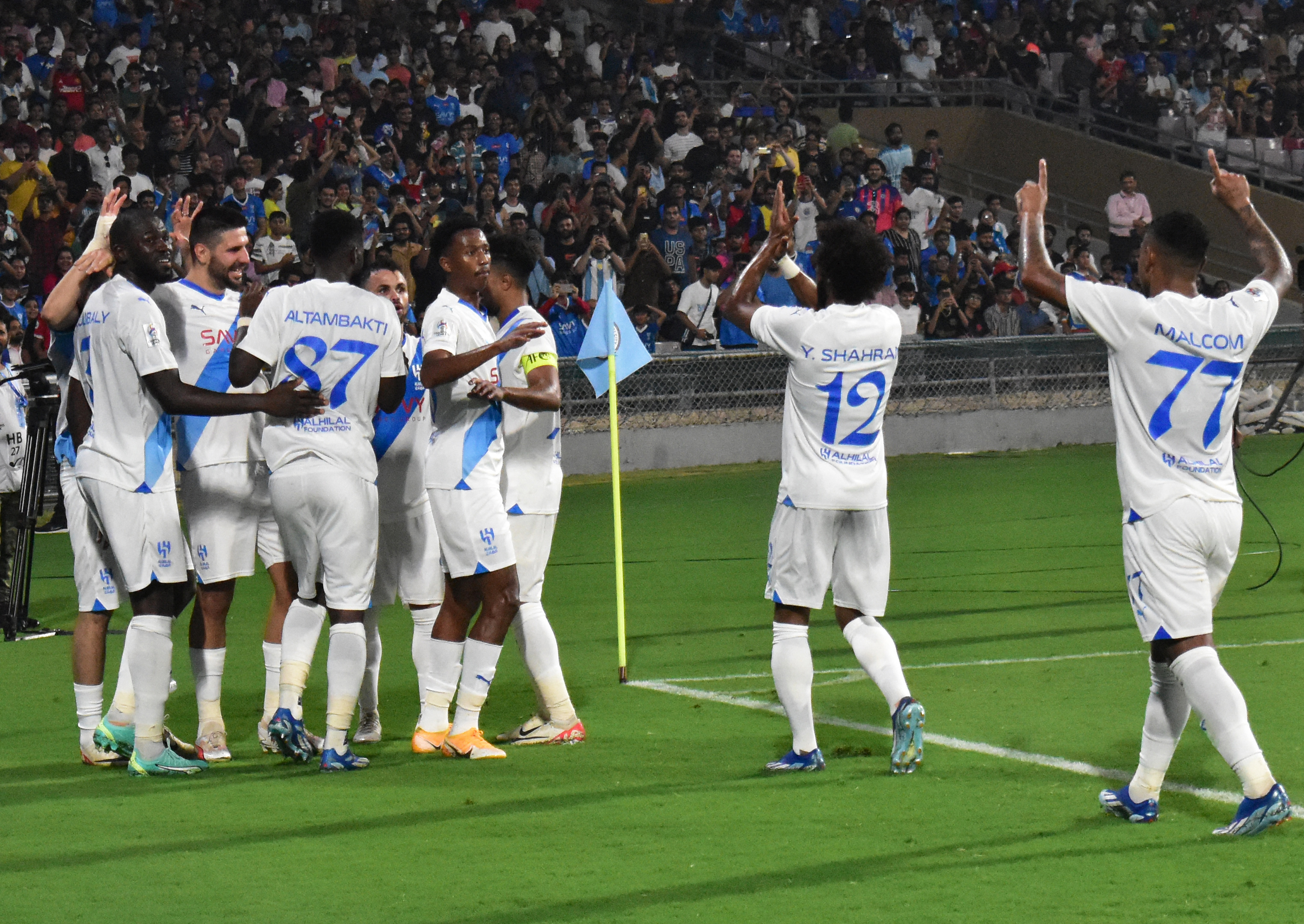 Al-Hilal SFC's players celebrate after scoring a goal during the AFC Champions League 2023/24 Group D football match between India's Mumbai City FC and Saudi Arabias Al-Hilal SFC at the D.Y. Patil stadium in Navi Mumbai on November 6, 2023. (Photo by AFP)