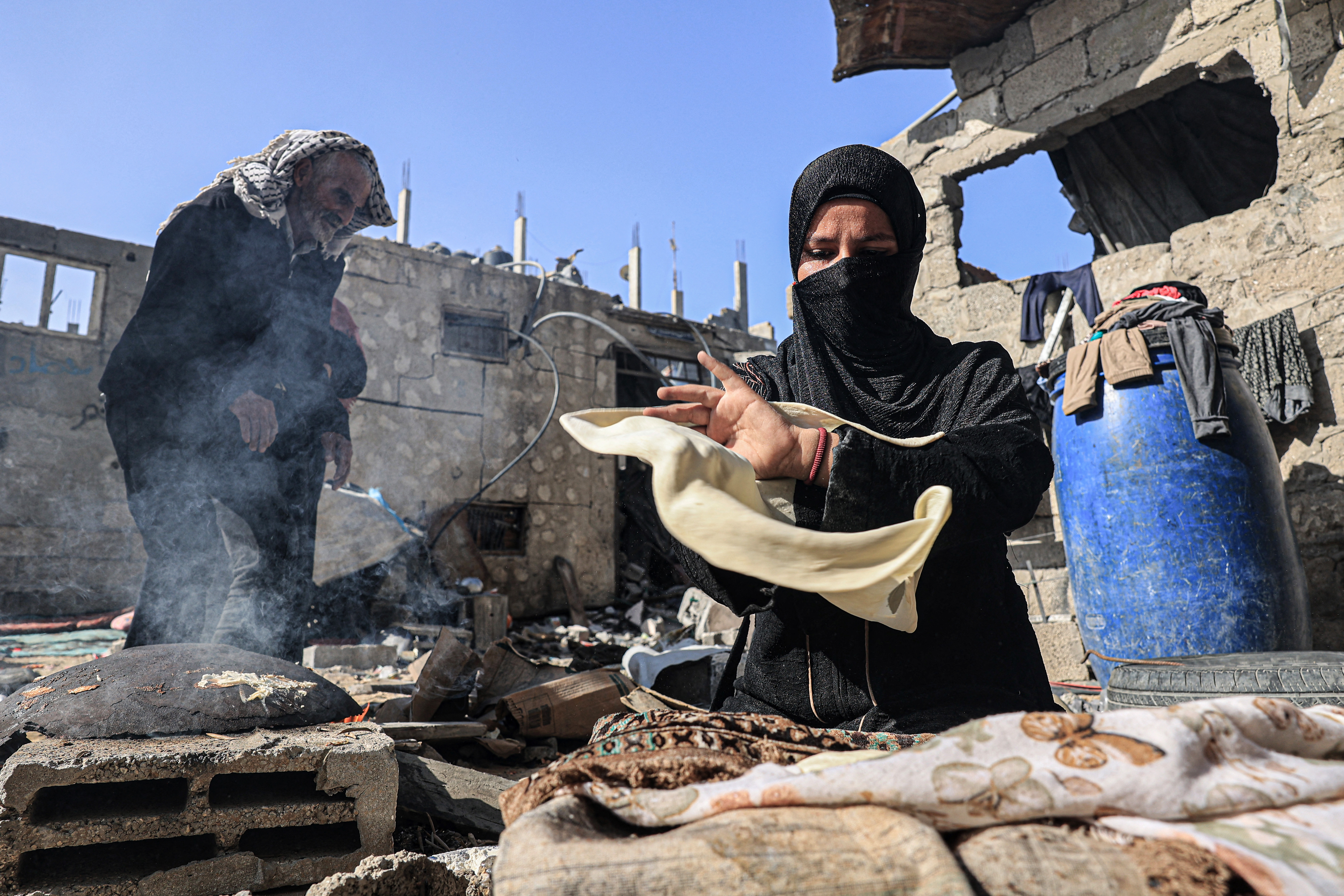 Amal al-Robayaa makes bread