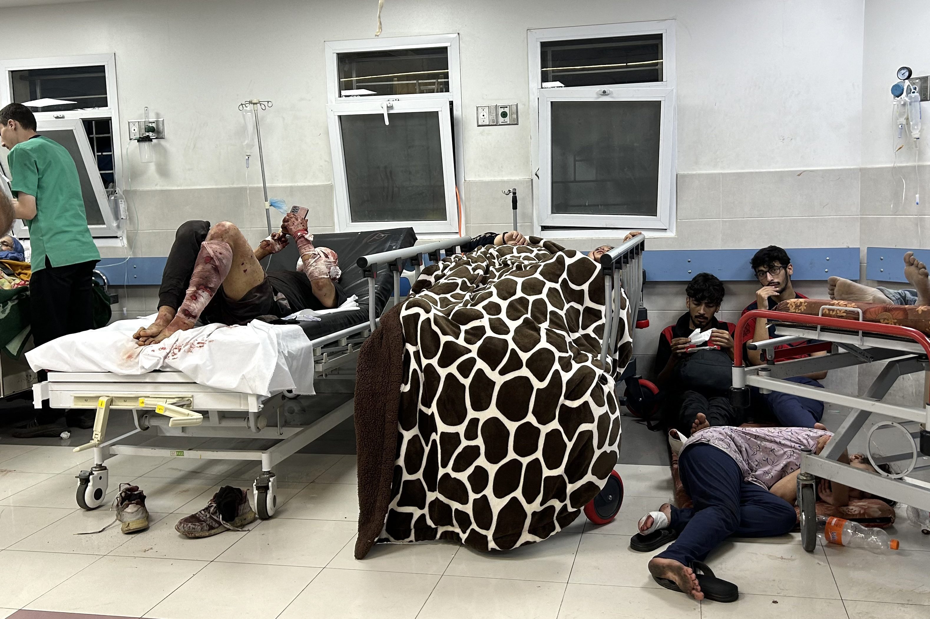 Patients rest at Al-Shifa hospital in Gaza City on November 10