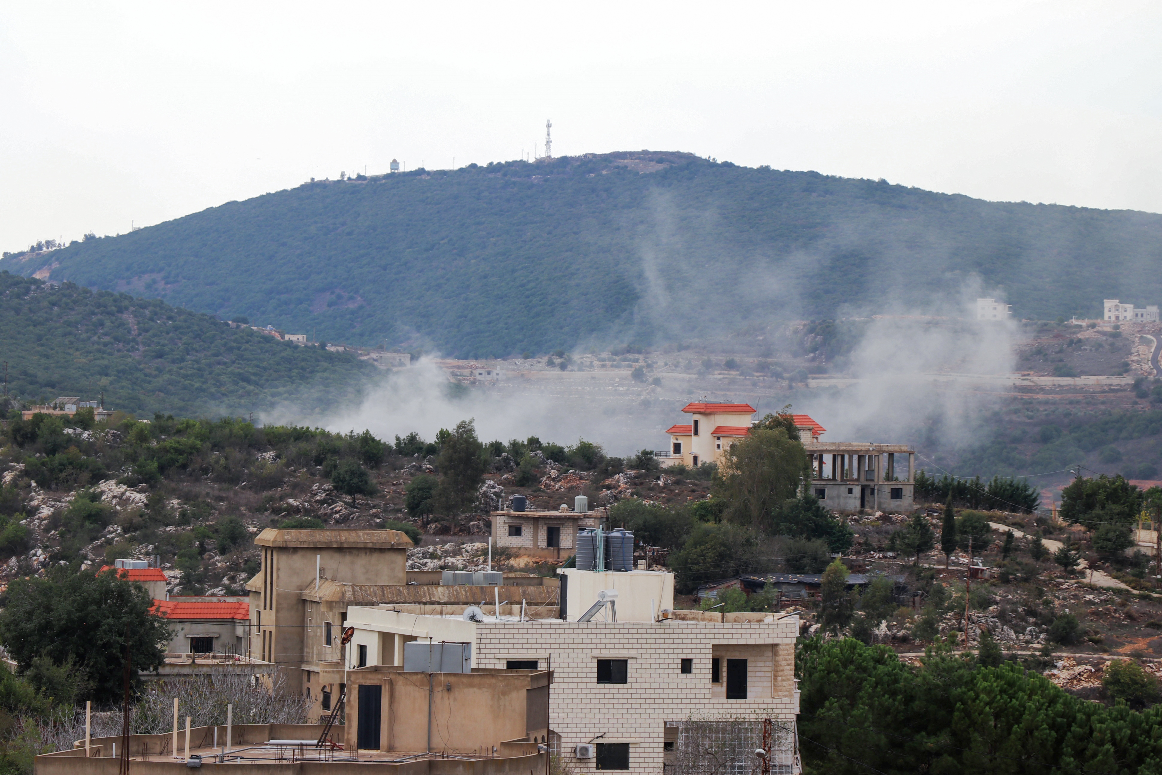 Smoke rises following Israeli artilley shelling on the village of Beit Lif, along Lebanon's southern border with northern Israel on November 13, 2023 [AFP]