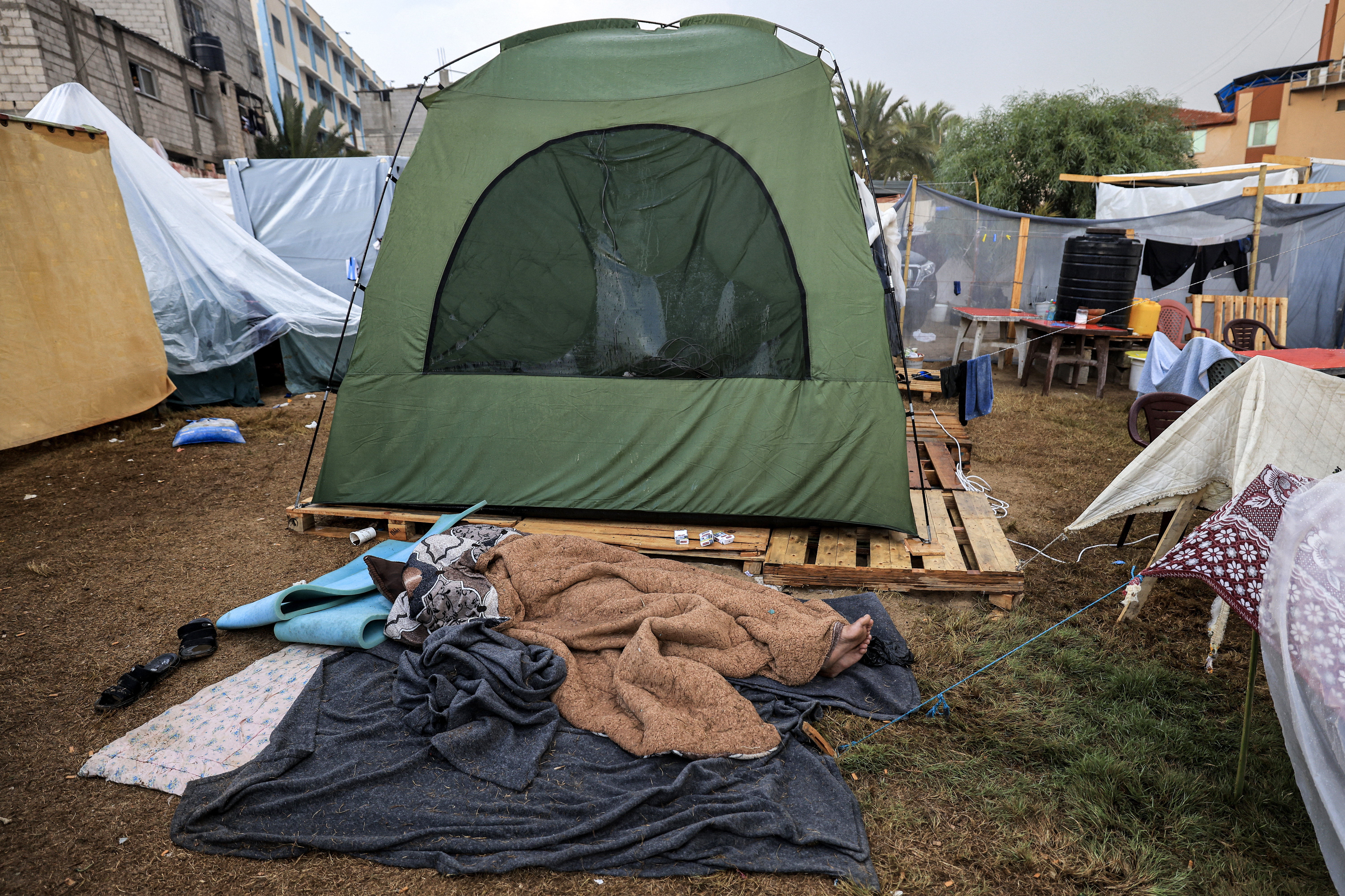 This picture taken on November 14, 2023 shows a view of some of the tents pitched by Palestinians taking shelter from Israeli bombardment around Nasser Hospital, in Khan Yunis