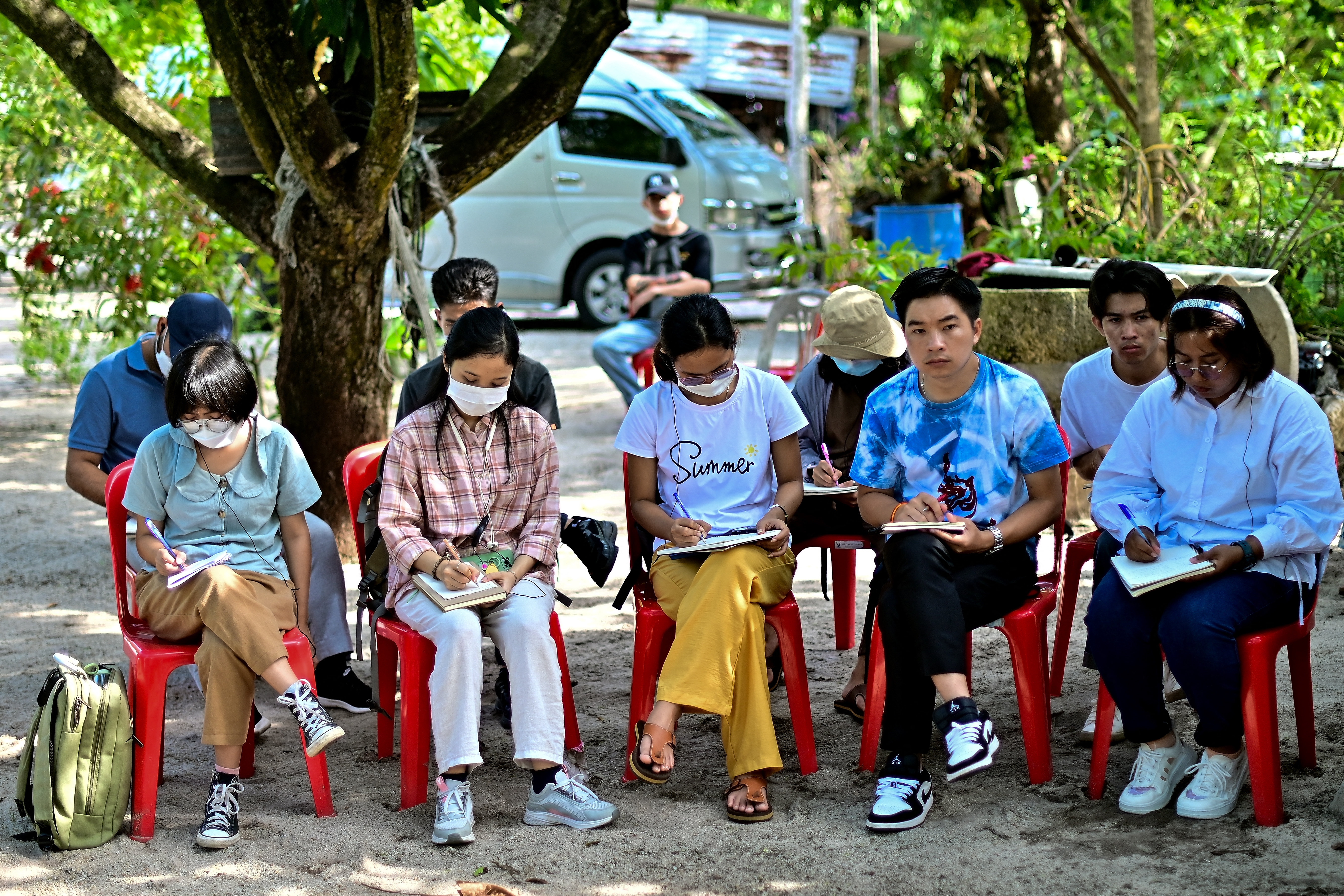 This photograph taken on November 7, 2023 shows environment activists studying with the EarthRights School during a field trip in the coastal Thai province of Rayong.