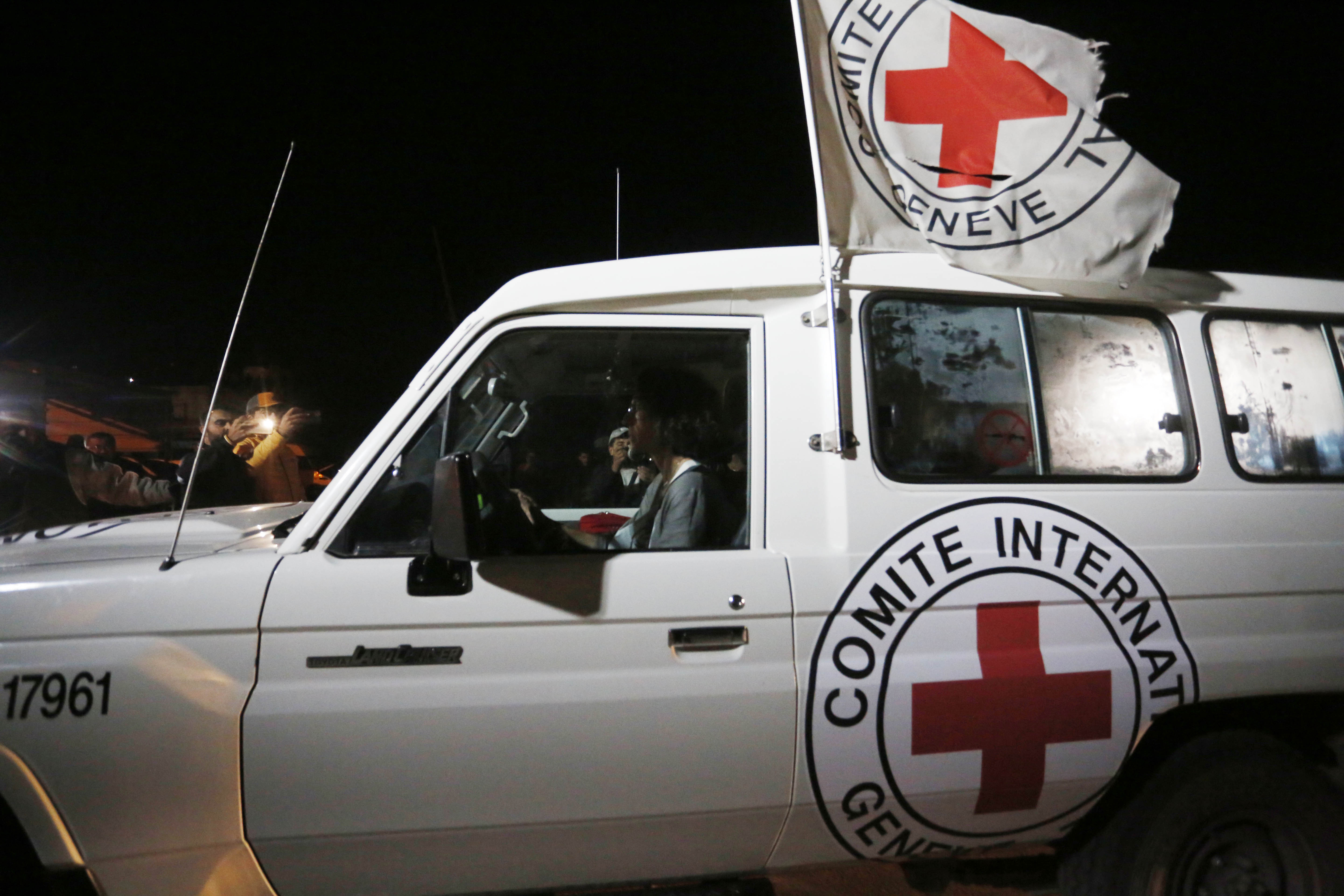 A group of prisoners handed over to Red Cross officials by Hamas in Gaza