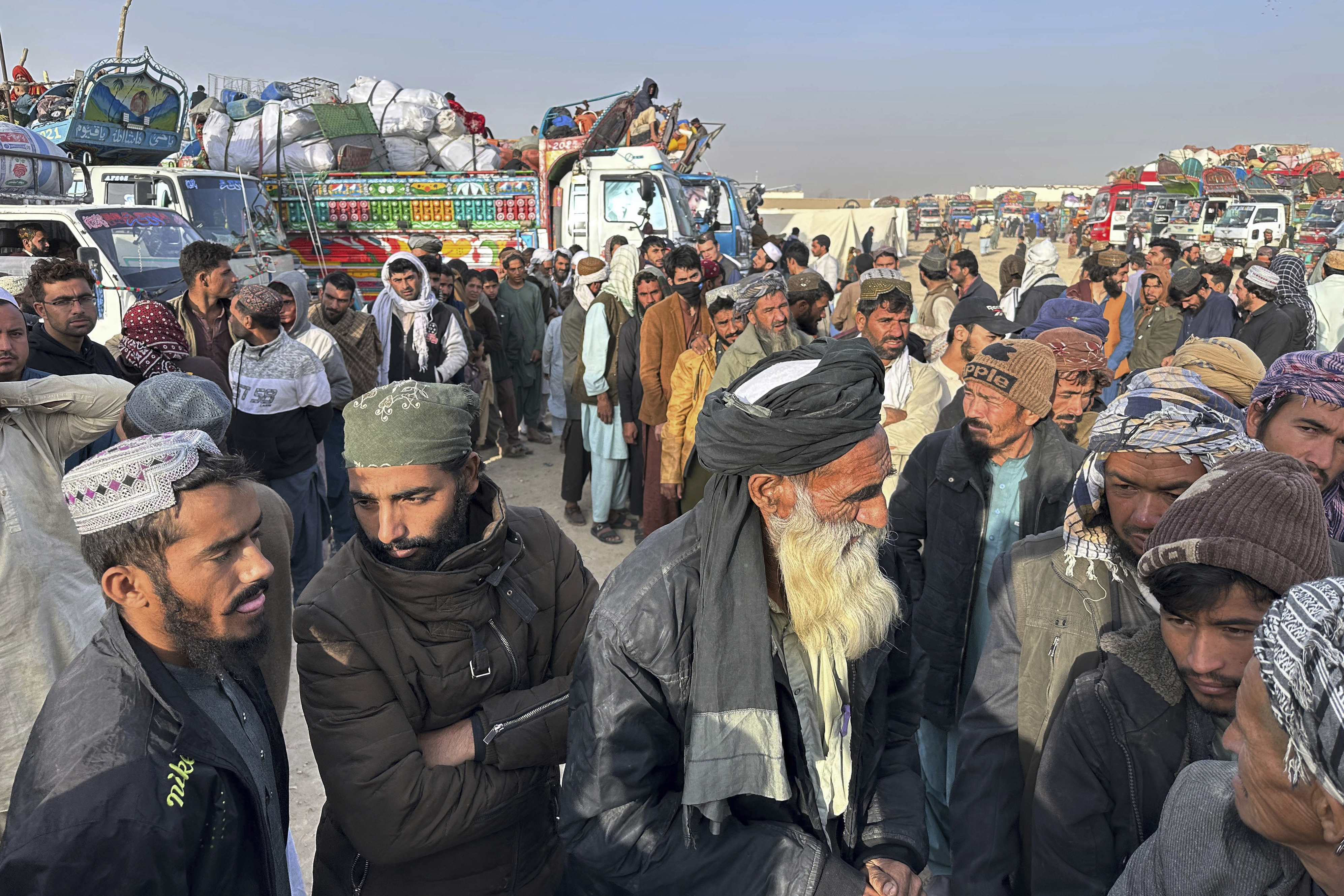Afghans wait for clearance to depart for their homeland at a deportation camp set up by authorities to facilitate illegal immigrants, in Chaman, a town on the Pakistan-Afghanistan border.