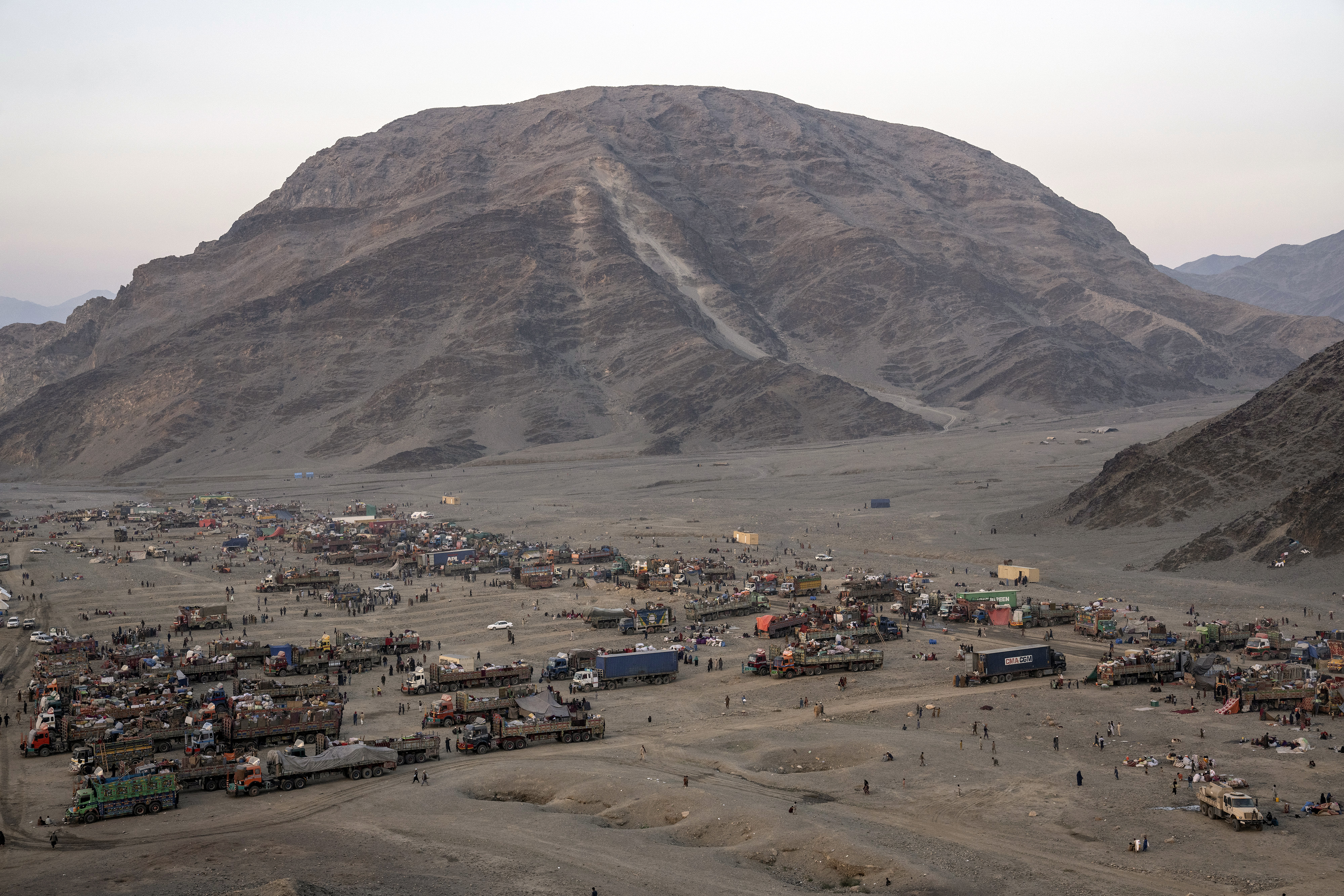 Afghan refugees settle in a camp near the Torkham Pakistan-Afghanistan border, in Torkham, Afghanistan.
