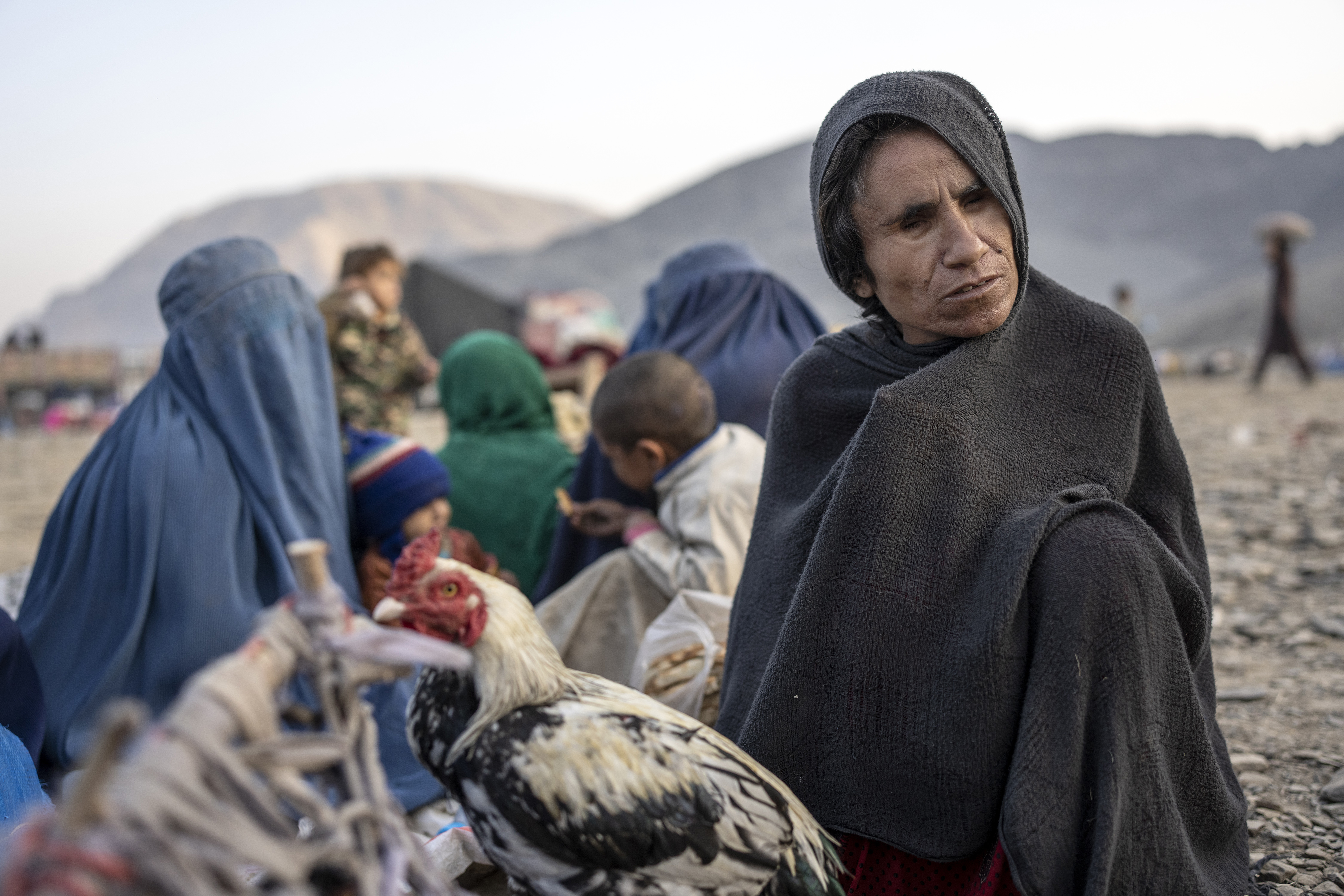 Afghan refugees settle in a camp near the Torkham Pakistan-Afghanistan border in Torkham, Afghanistan, Saturday.