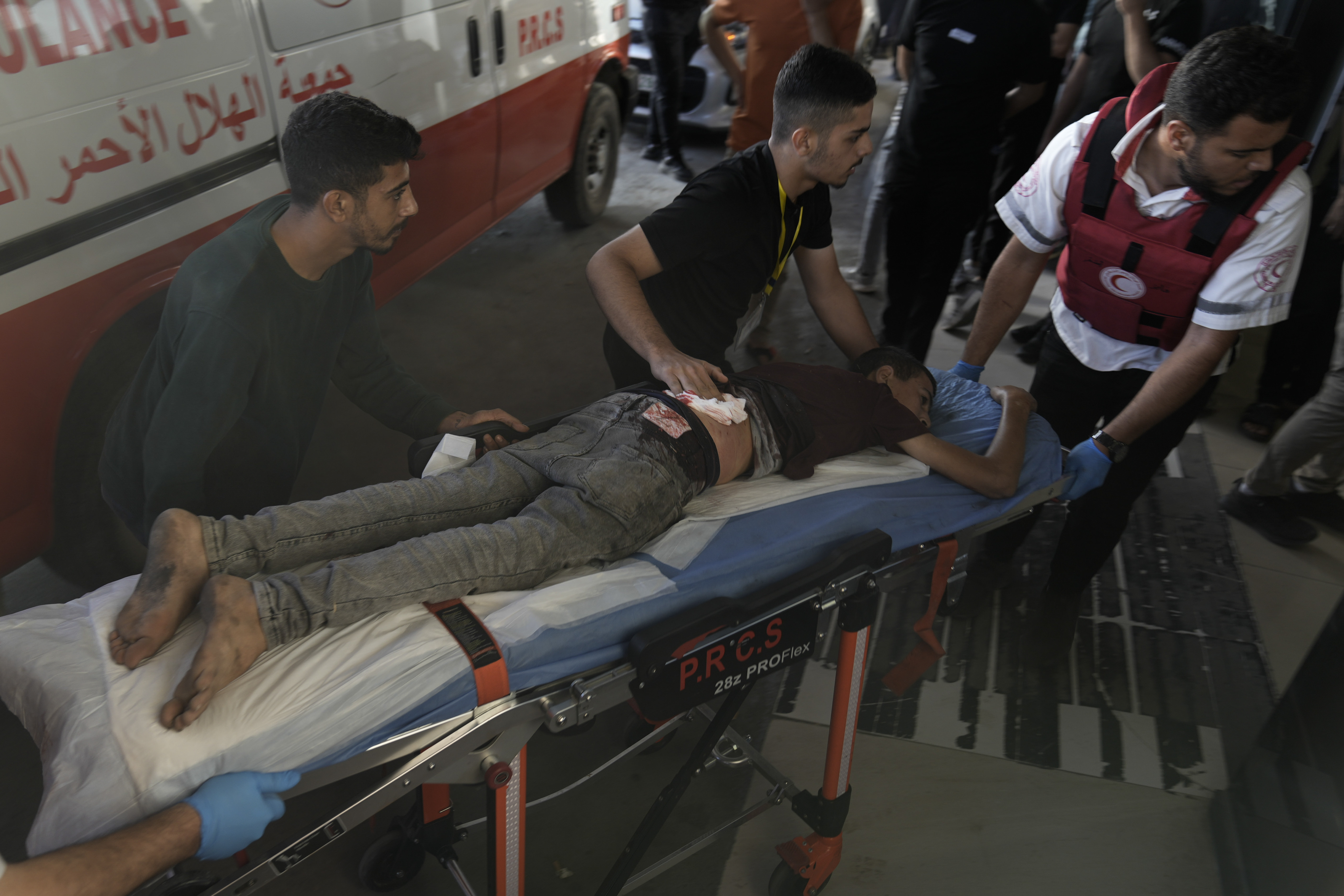 A wounded Palestinian is brought to a hospital during clashes with Israeli forces in Jenin refugee camp in the West Bank.