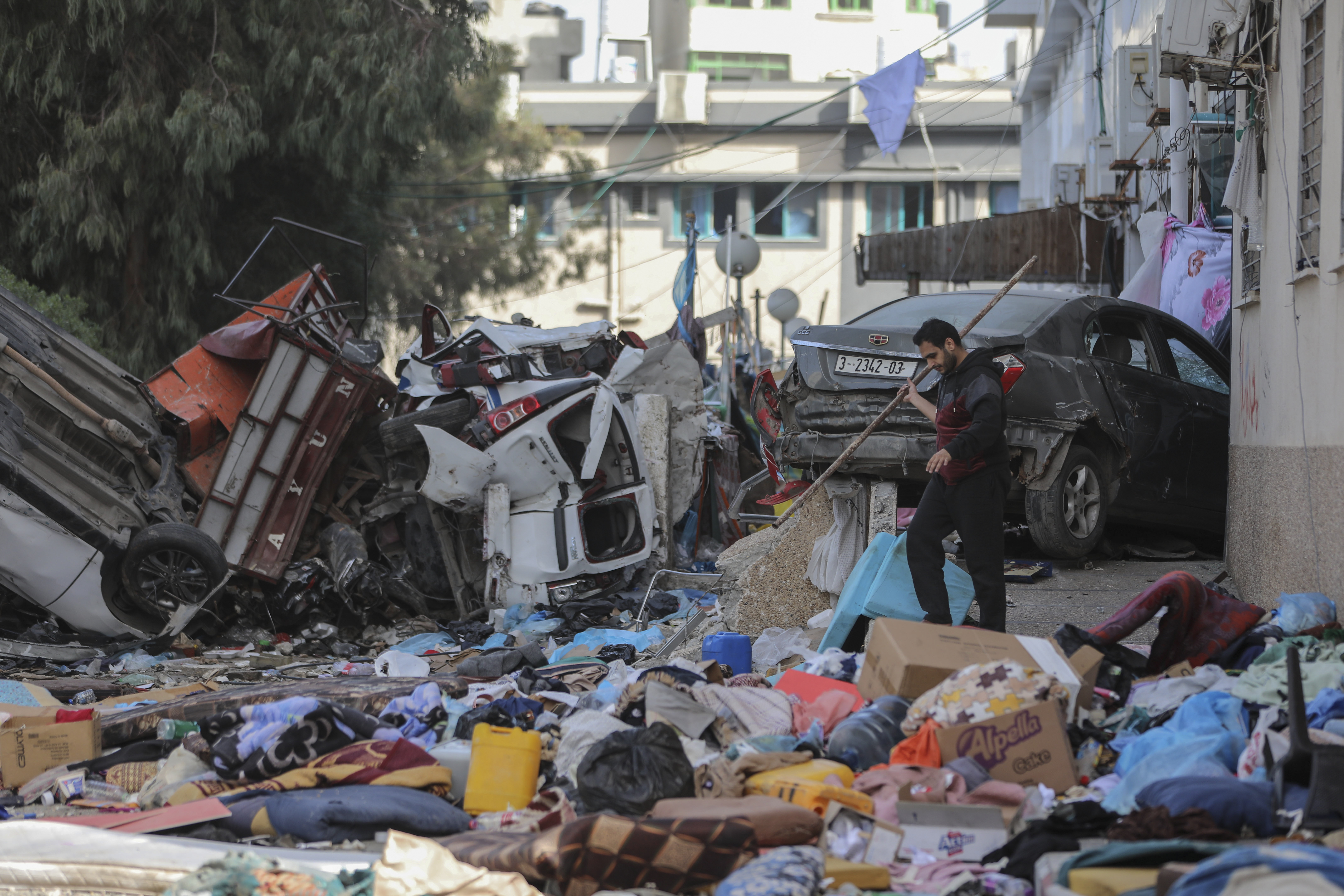 A Palestinian walks through Shifa Hospital grounds in Gaza City