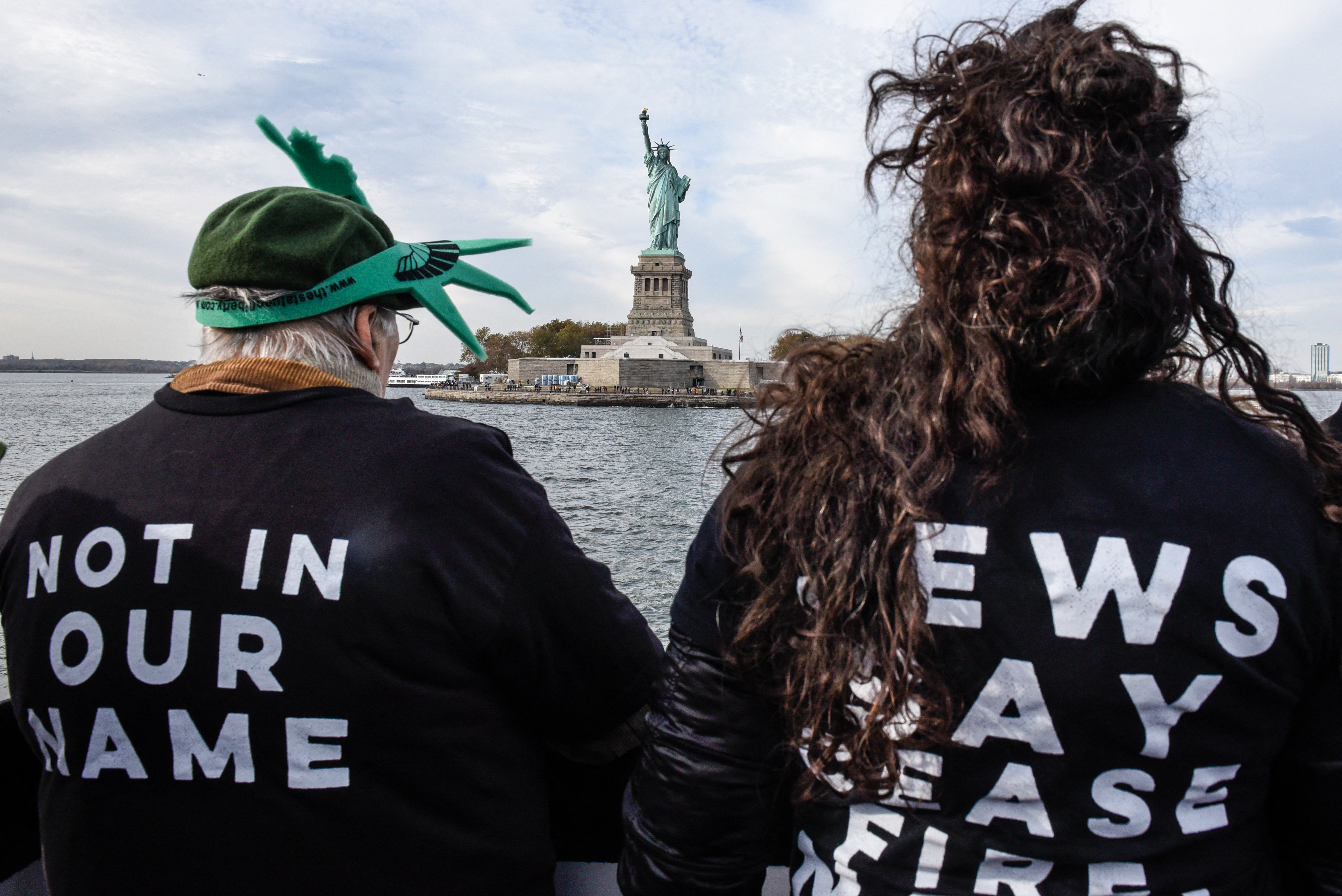 Activists from Jewish Voice for Peace occupy the Statue of Liberty
